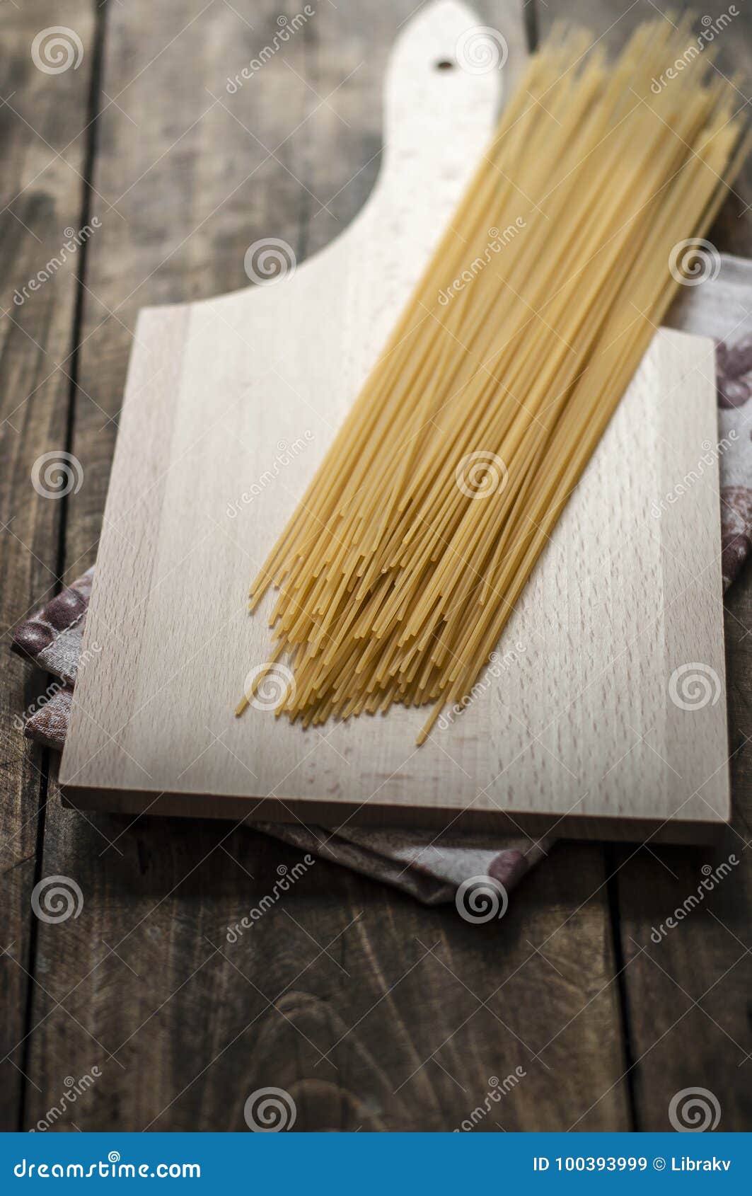 Spaghetti Pasta on a Cutting Board Stock Image Image of uncooked