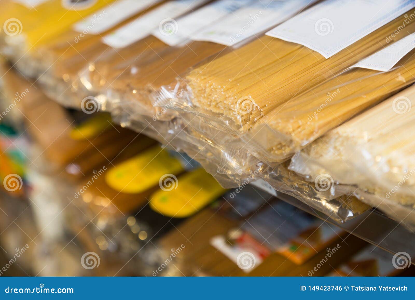 Spaghetti in Plastic Packaging on Shelves Stock Photo Image of pack, isolated 149423746