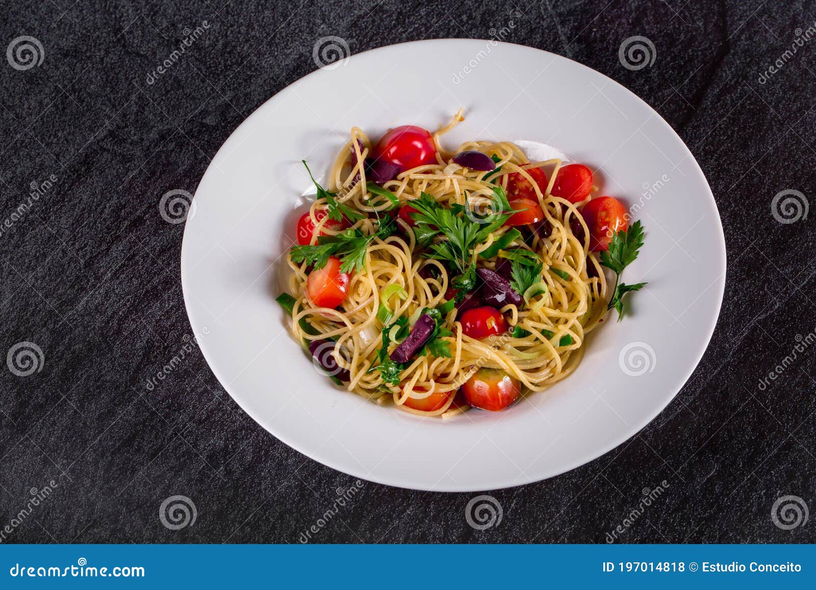 Spaghetti Puttanesca. Spaghetti with Black Olives and Cherry Tomatoes