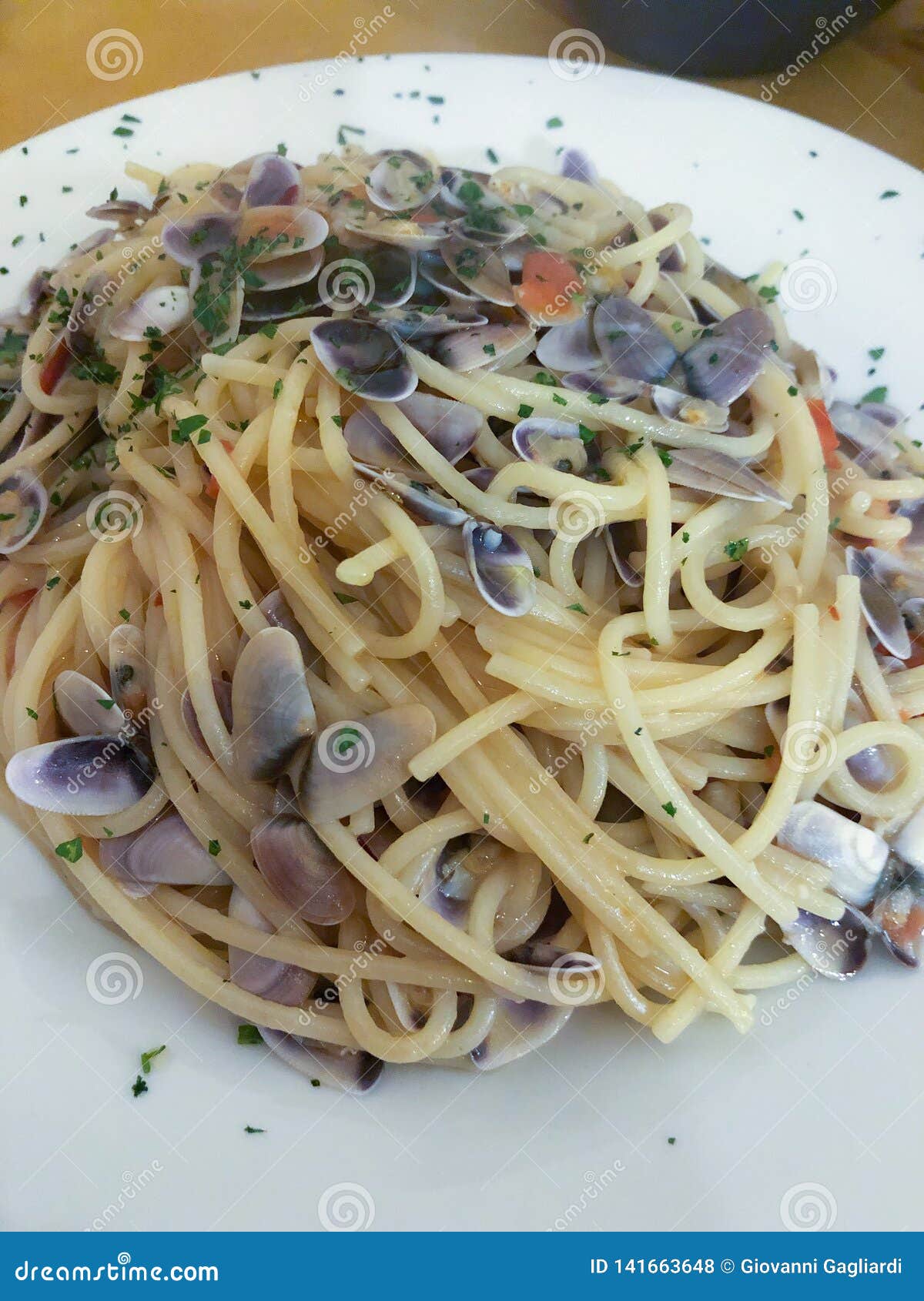 Spaghetti with sea fruits stock photo. Image of plate 141663648