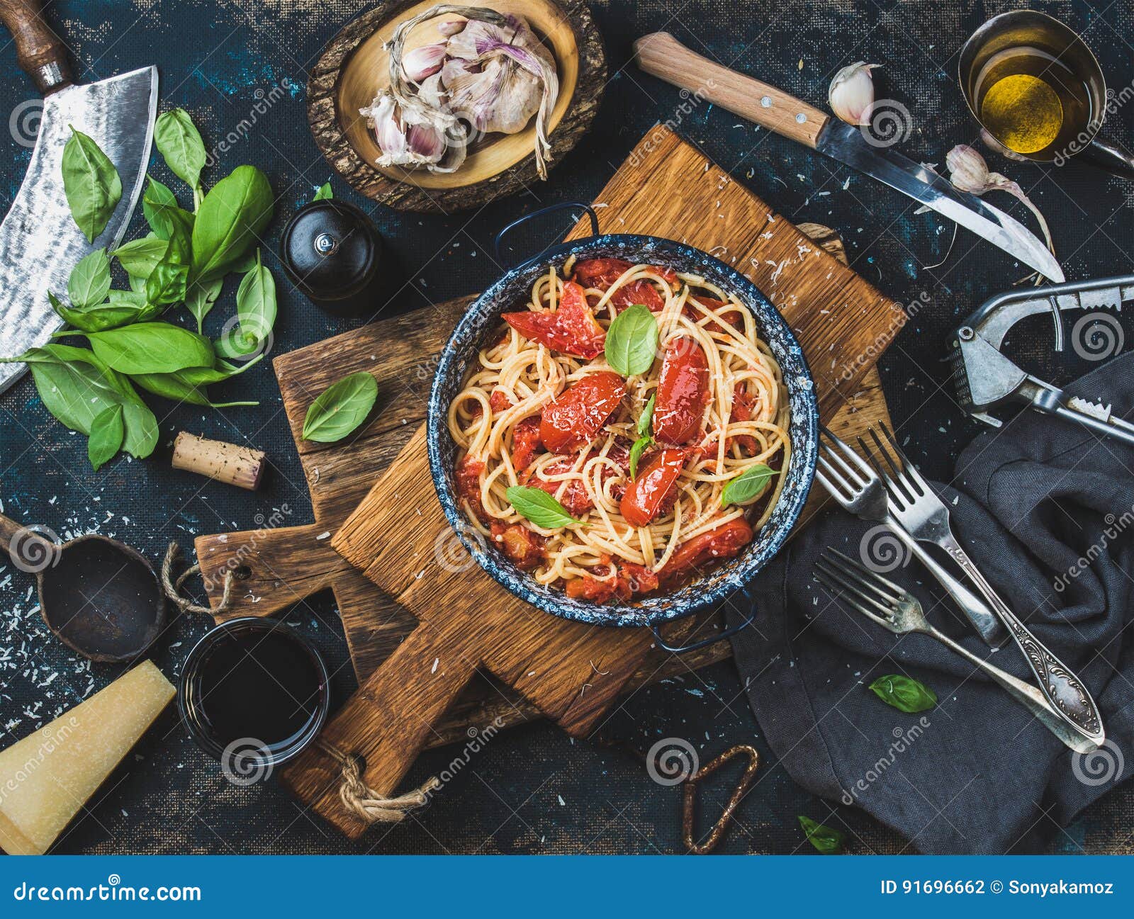 Spaghetti with Tomato and Basil in Plate on Wooden Board Stock Photo ...