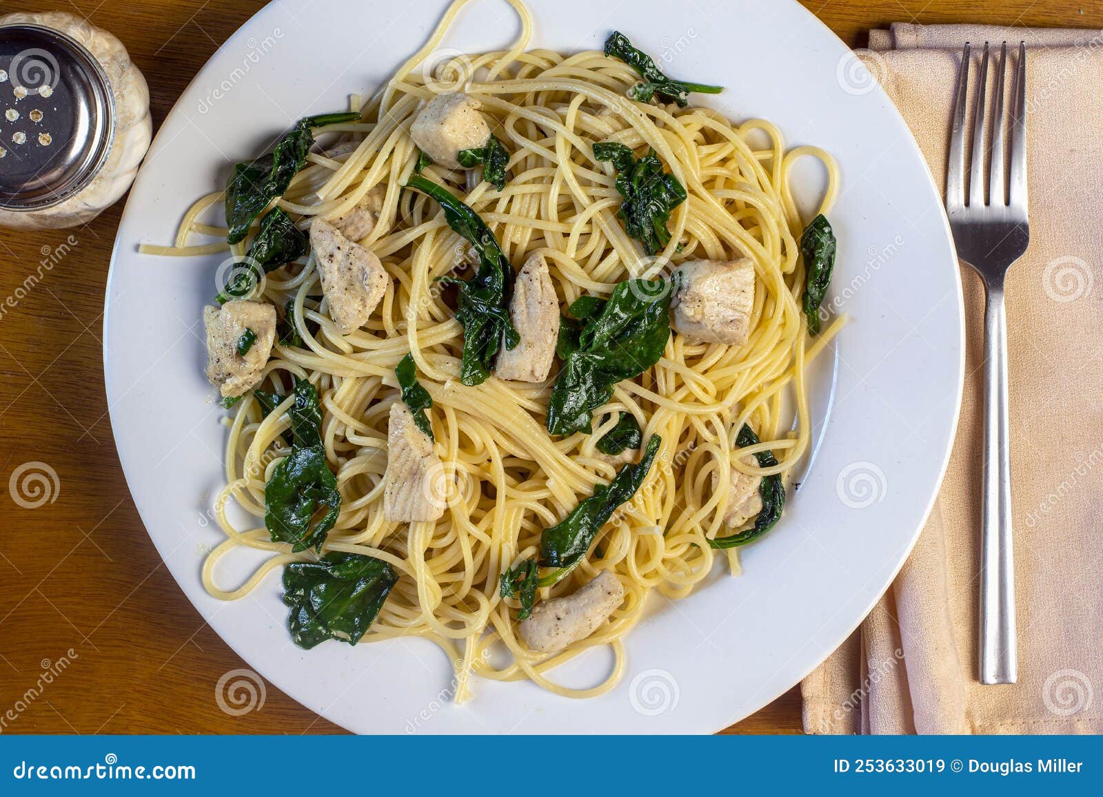 Spaghetti Top with Chicken and Sauteed Spinach Stock Image Image of