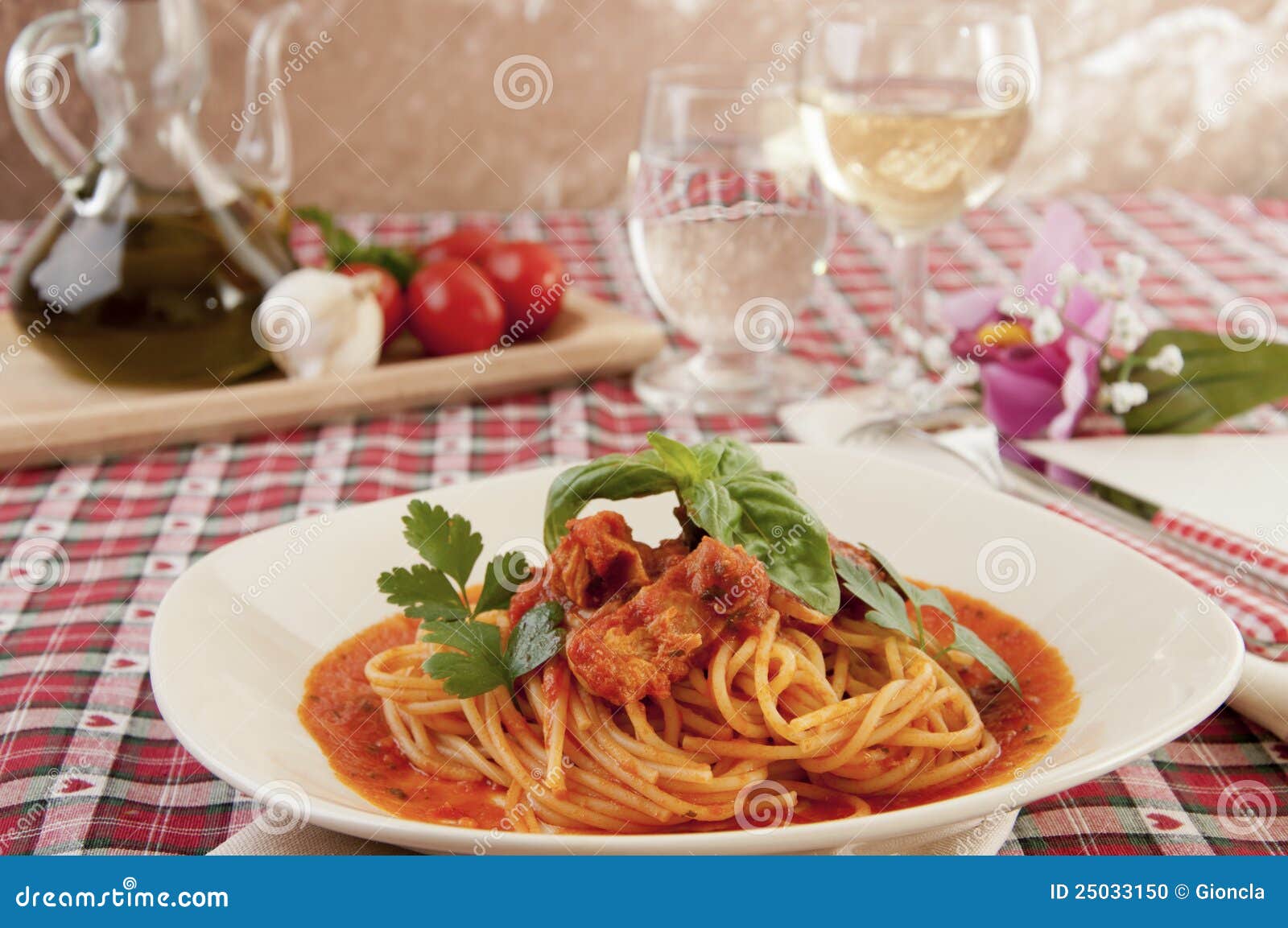 Spaghetti with tuna sauce stock photo. Image of grass 25033150
