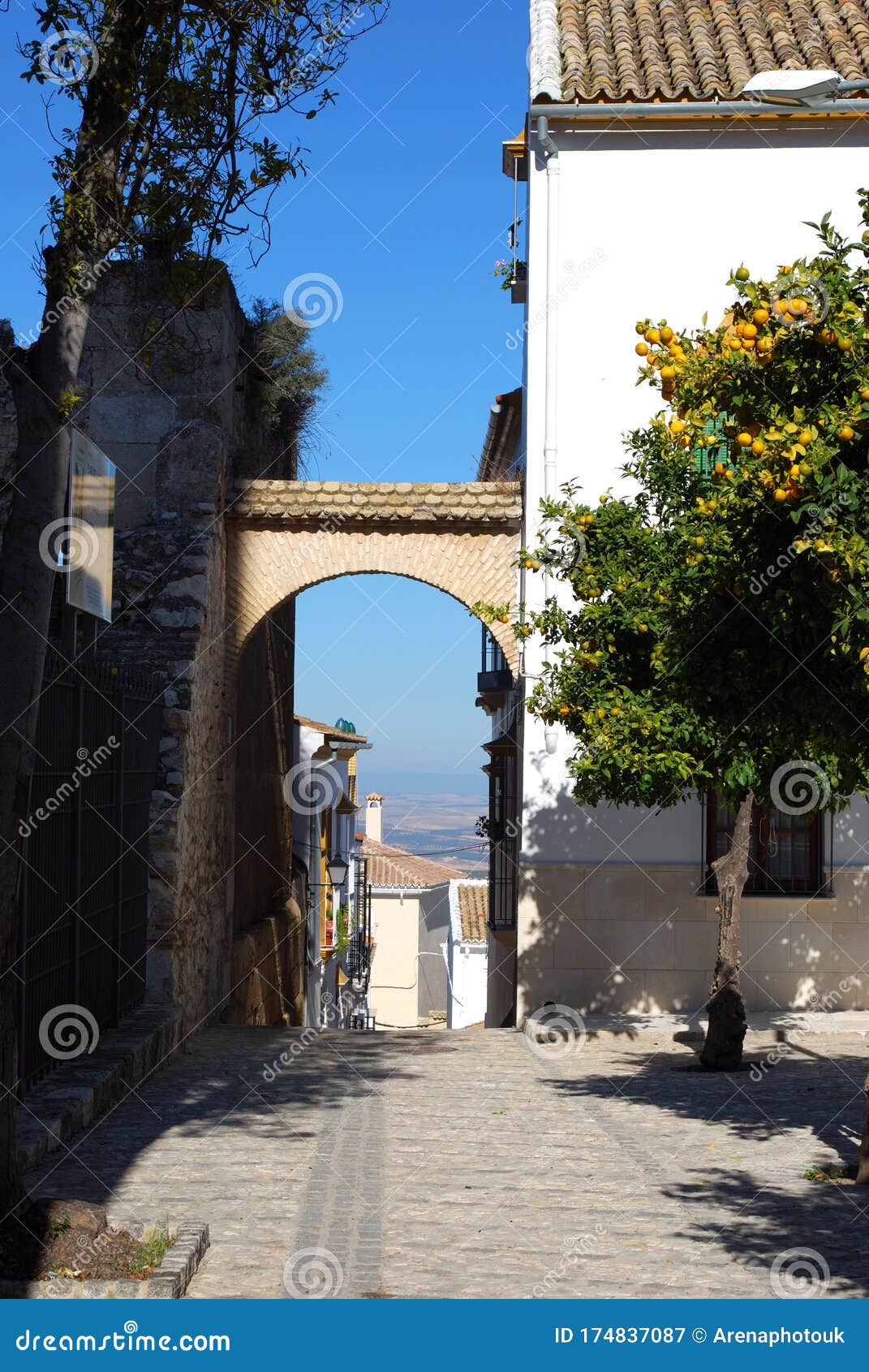 archway in town centre, estepa, spain.
