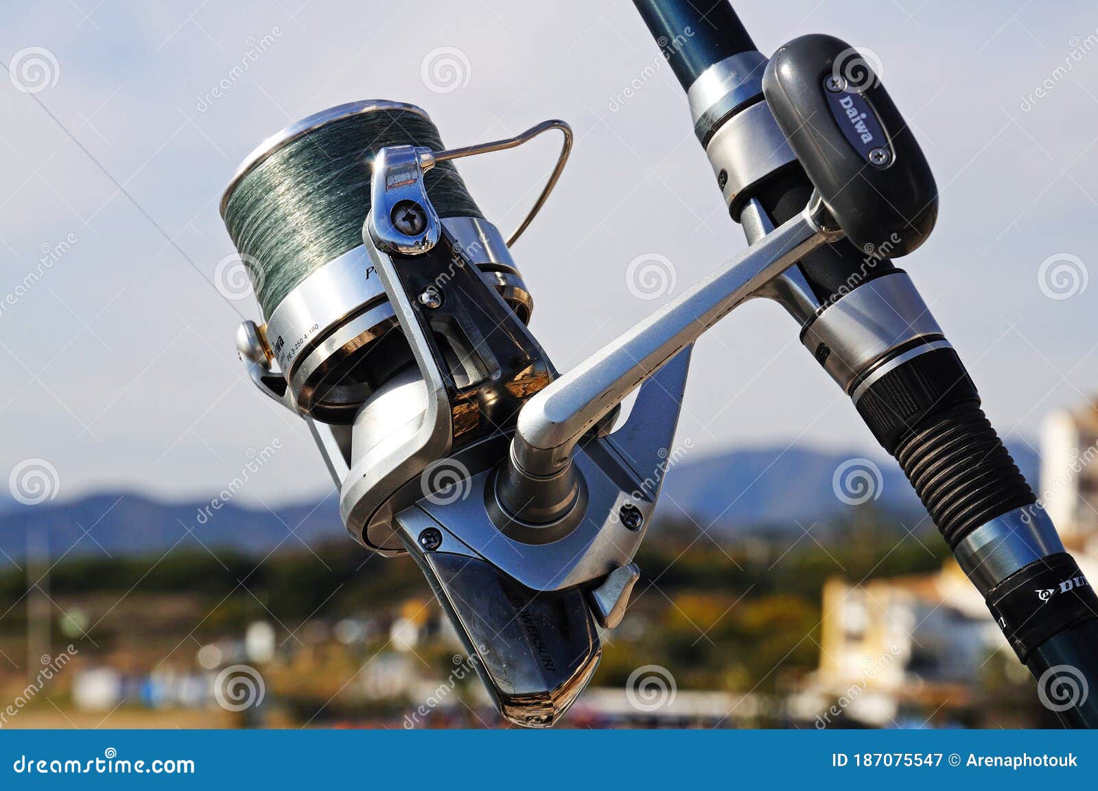 Daiwa fishing reel, Spain. editorial photography. Image of daiwa - 187075547