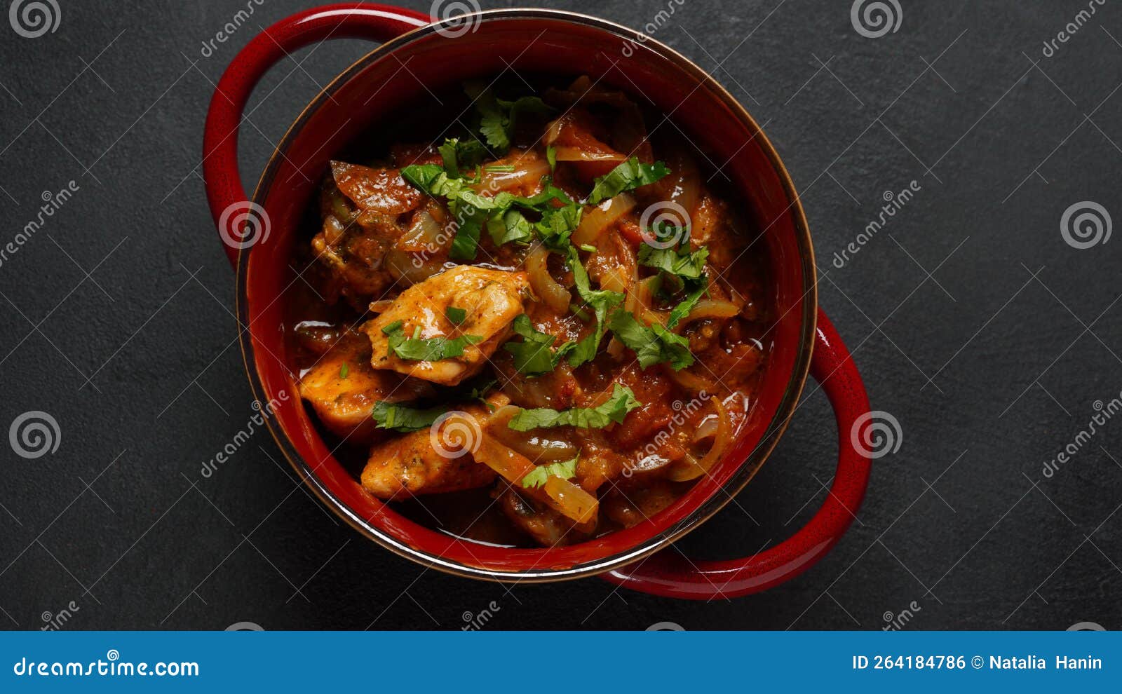 Spanish Chicken Stew with Tomatoes, Onion and Spices Stock Photo
