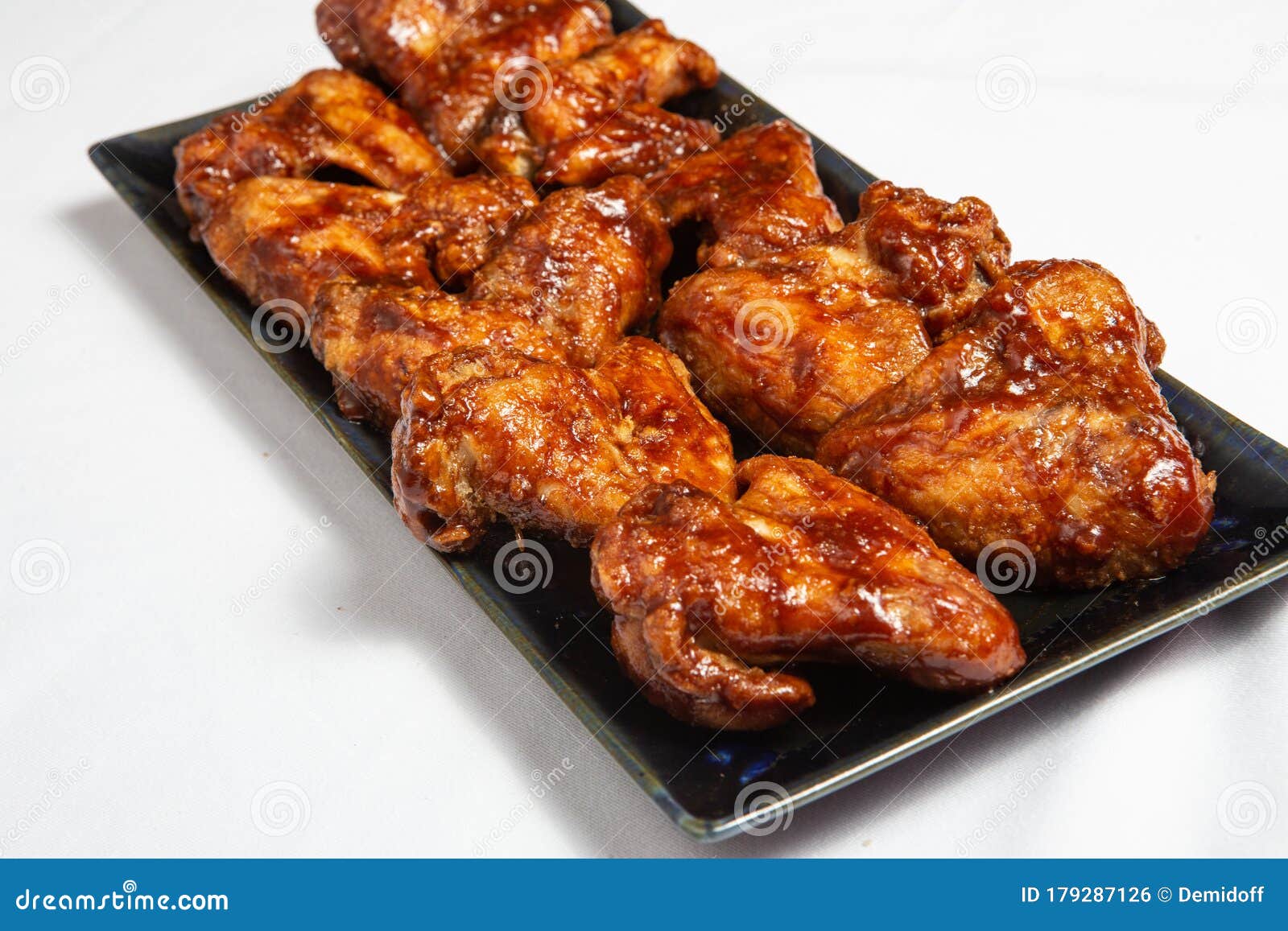Spanish Chicken Wings in Sauce Stock Photo - Image of finger, food:  179287126