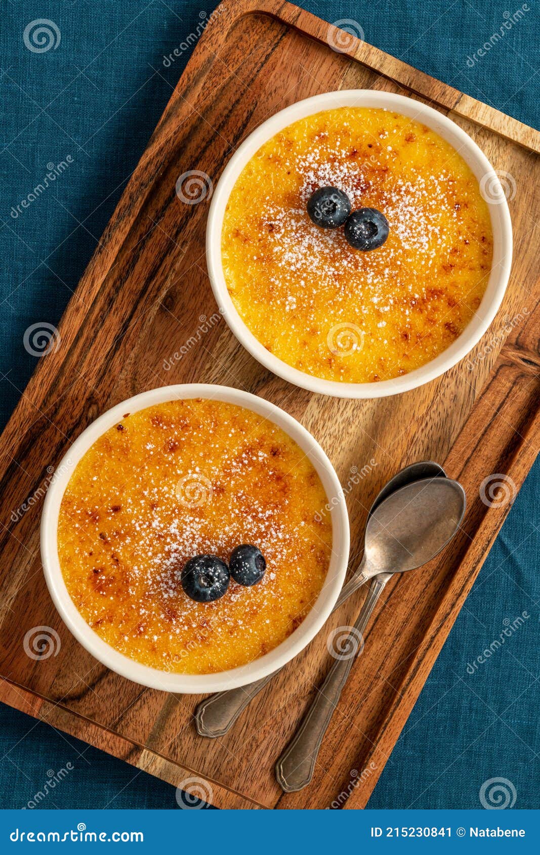 spanish crema catalana, rich custard base topped layer of caramelized sugar. top view, vertical