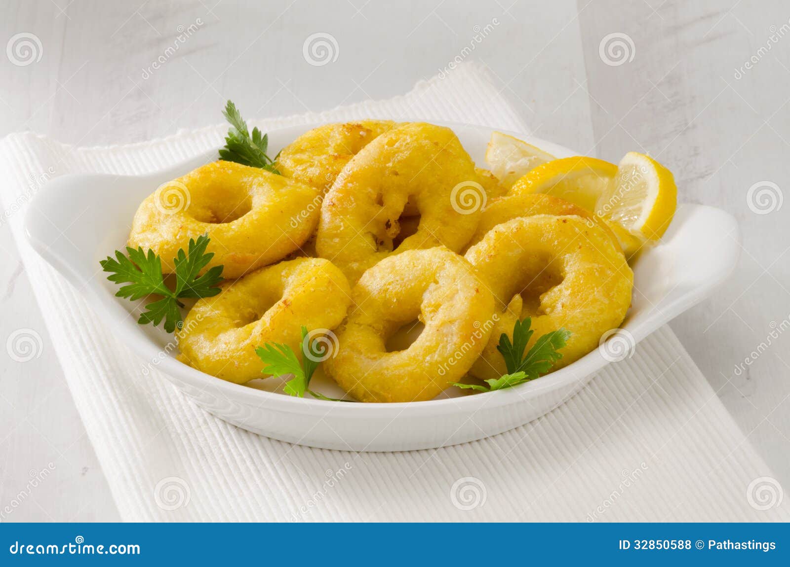 spanish cuisine. fried squid rings. calamares a la romana.