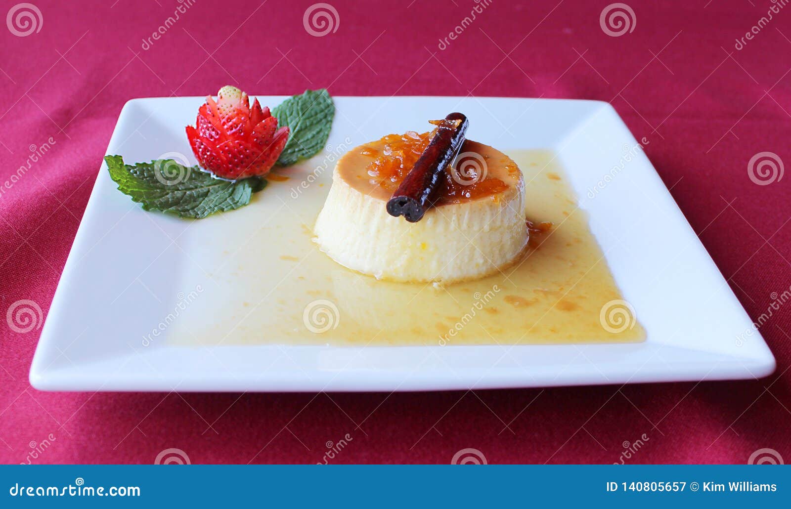 spanish flan postre dessert with strawberries