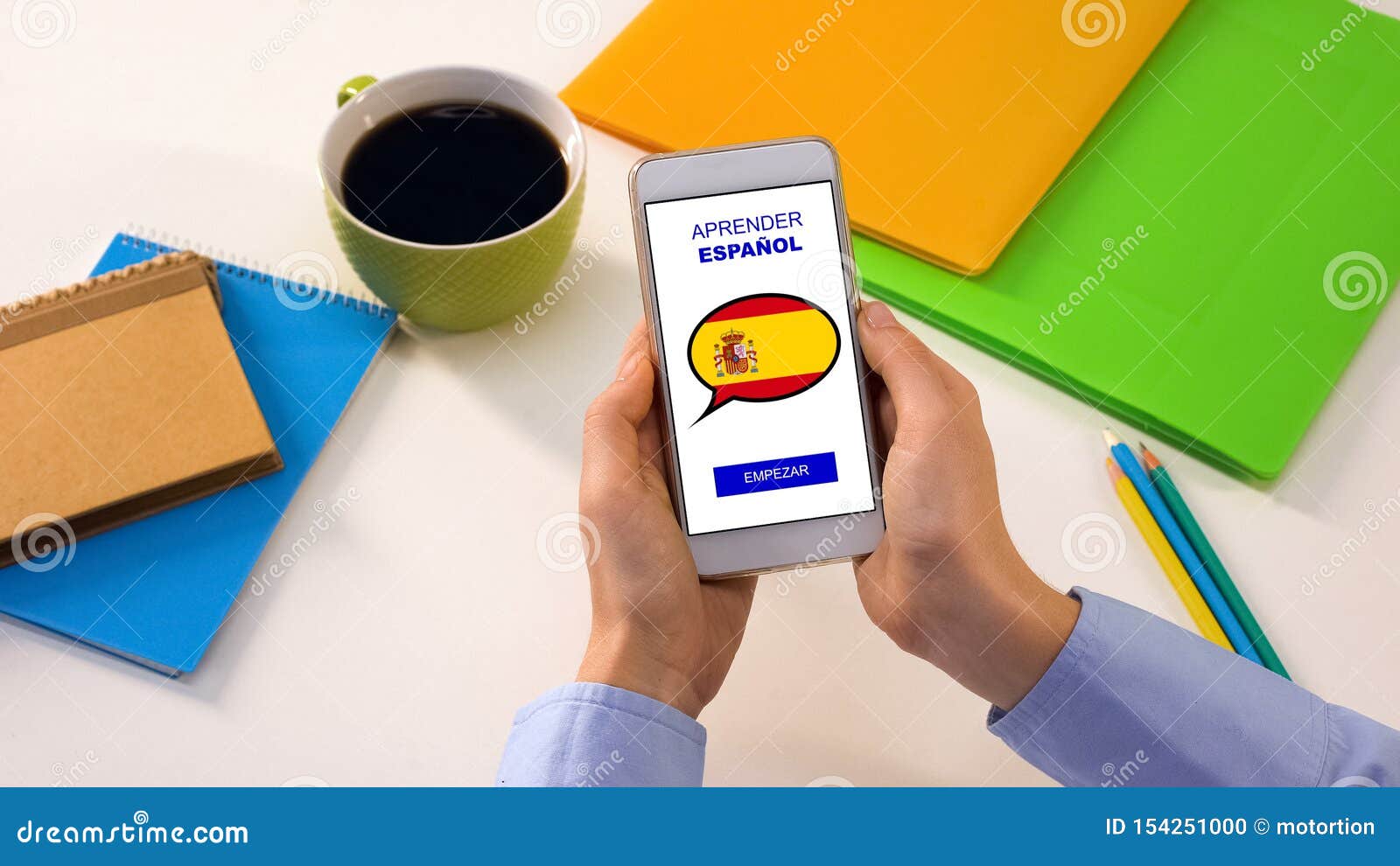 Spanish Language Application on Smartphone in Persons Hands, Online