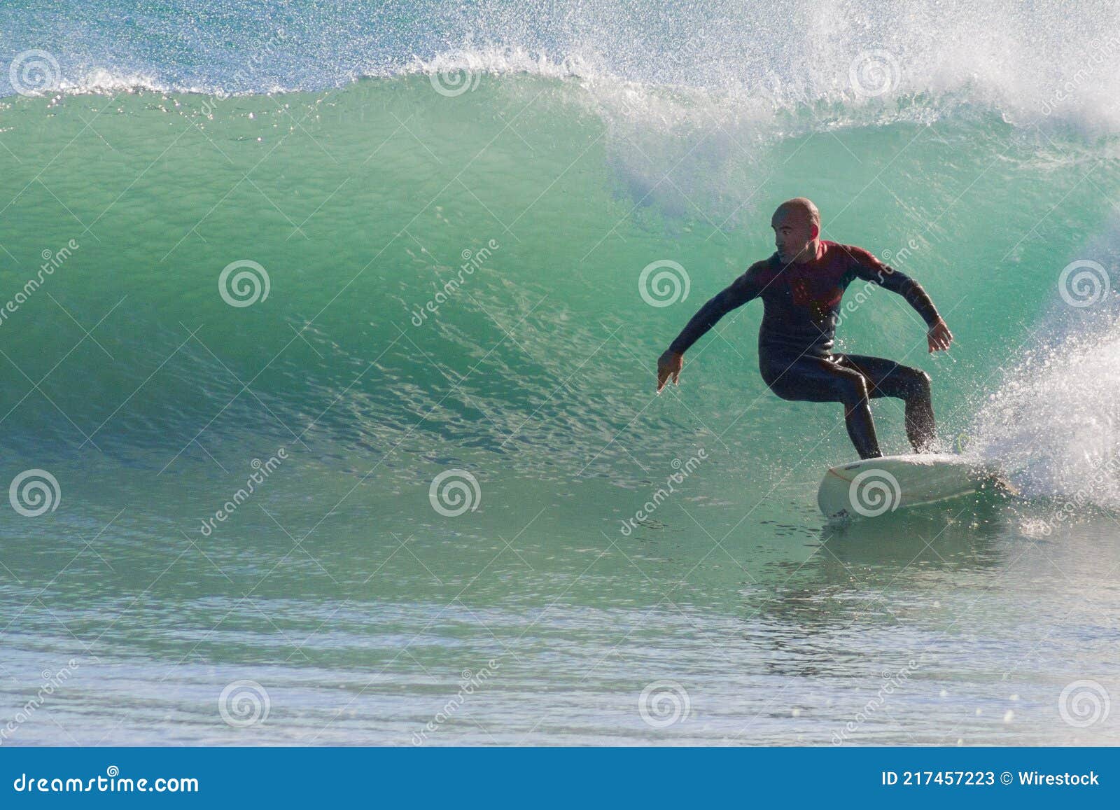 Spanish Male Catching the Wave on a Surfboard Stock Image Image of