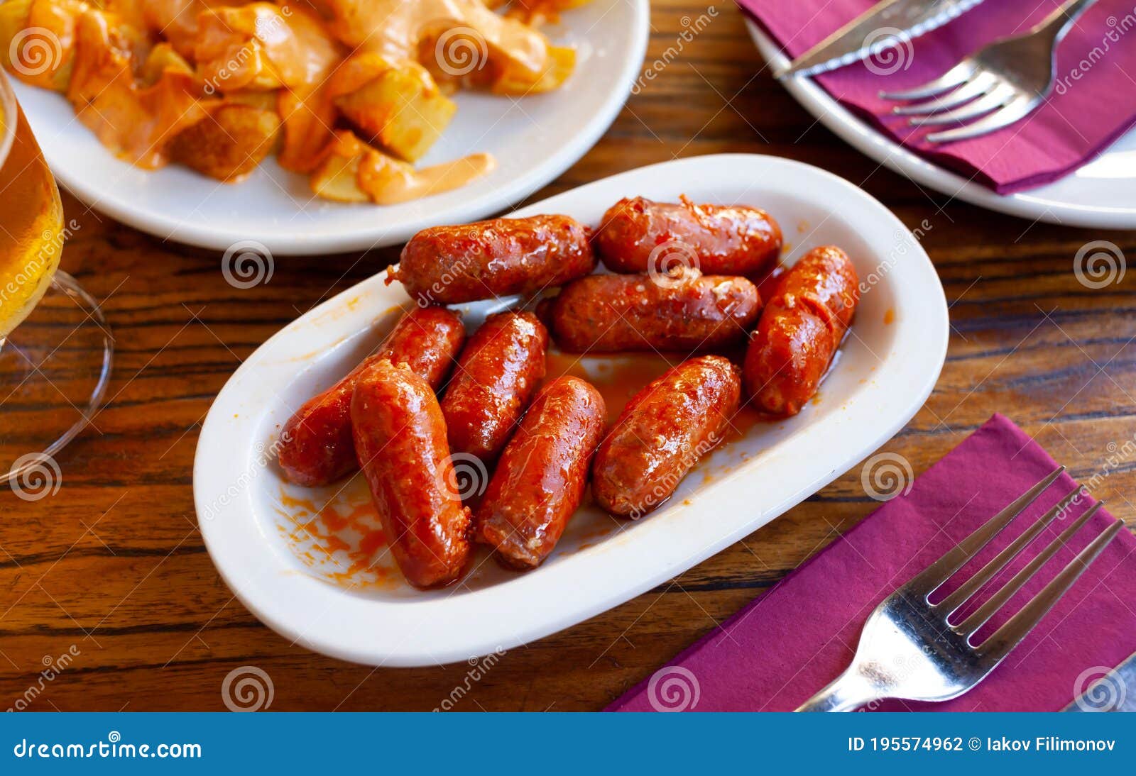 Spanish Mini Chorizo Sausages at Plate on Table Stock Photo Image of