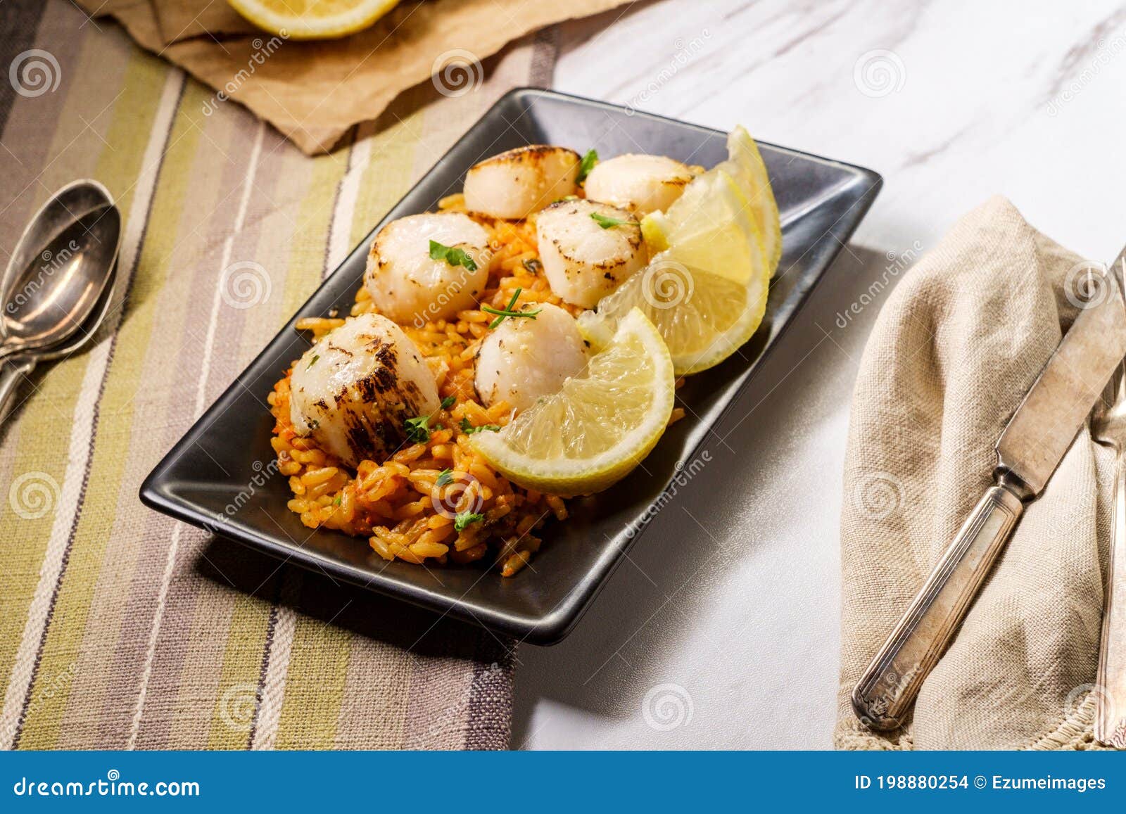 Spanish Rice Lemon Scallops Stock Photo Image of scallop, cooked