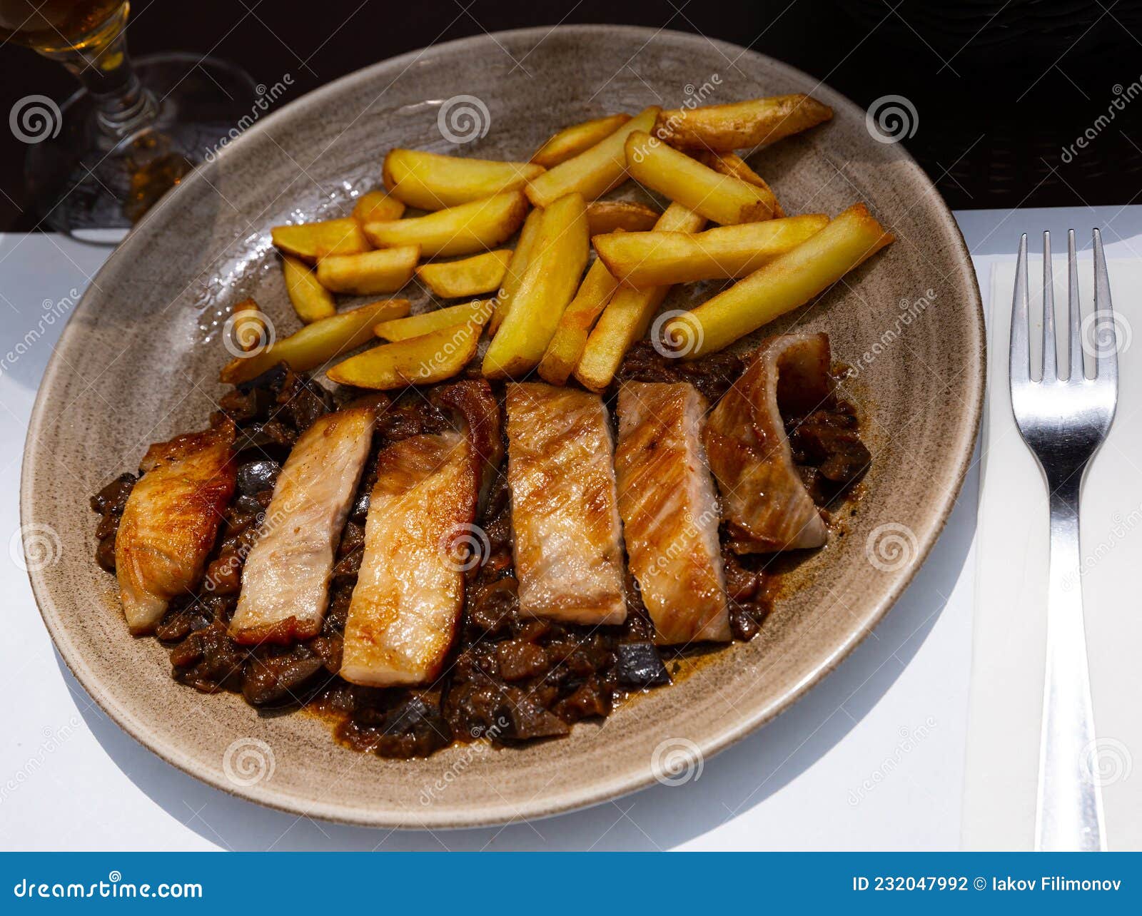 spanish secreto iberico - iberian pork in sweet wine with stewed vegetables