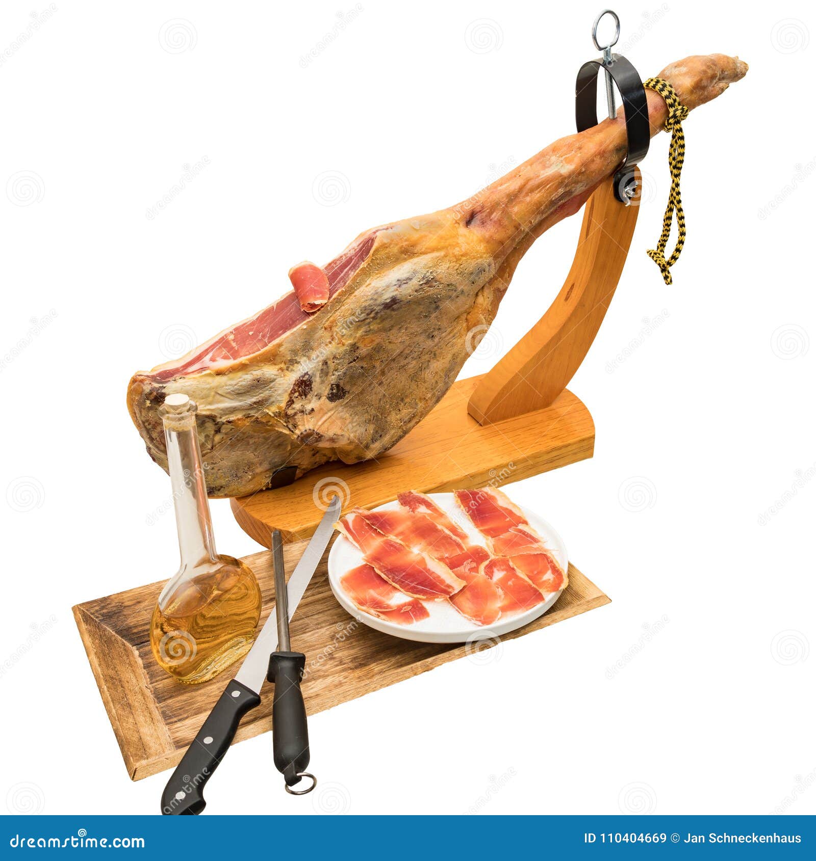 spanish serrano ham on the leg with wood holder.