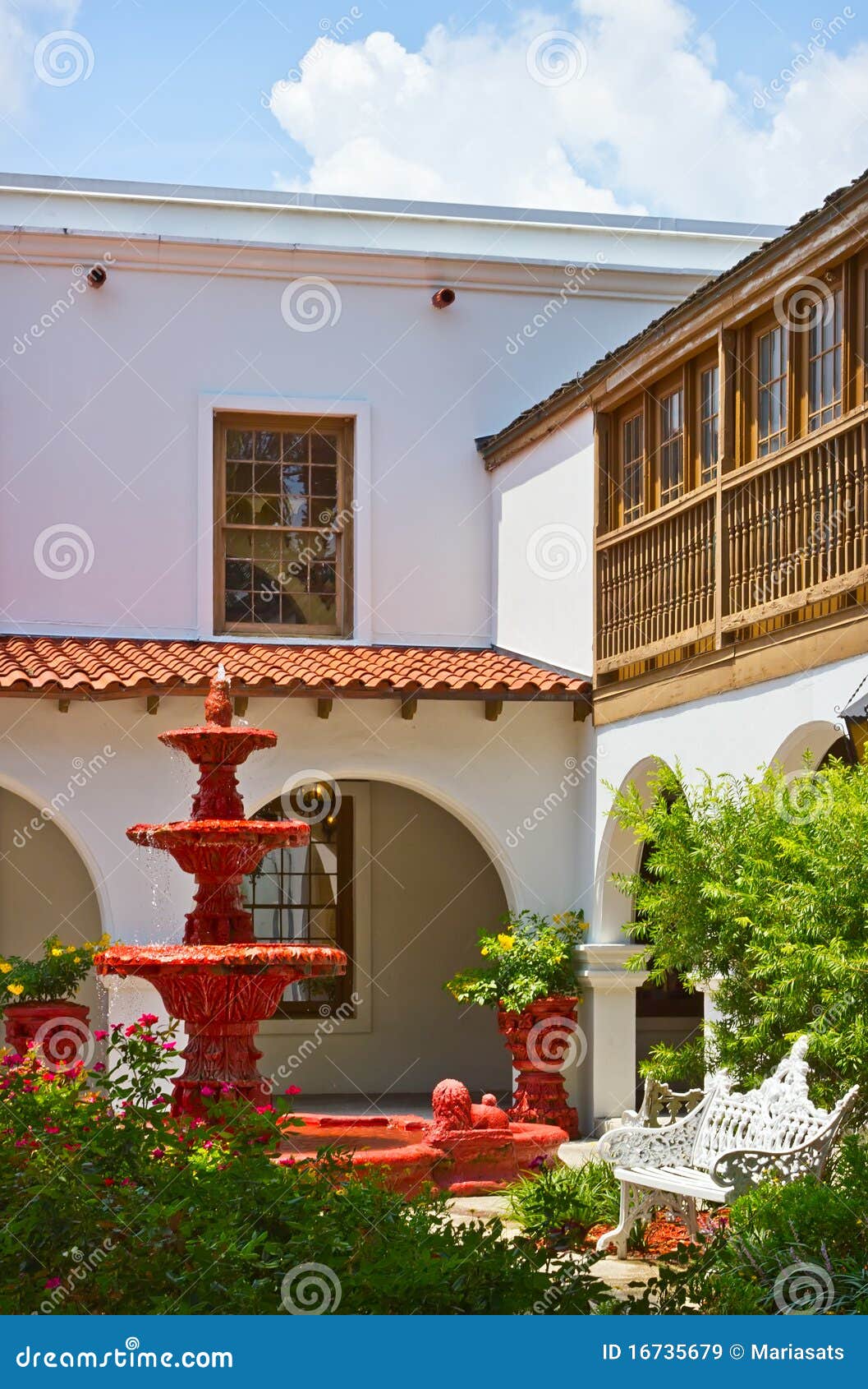 Spanish Style Patio With Red Fountain Stock Image Image of town