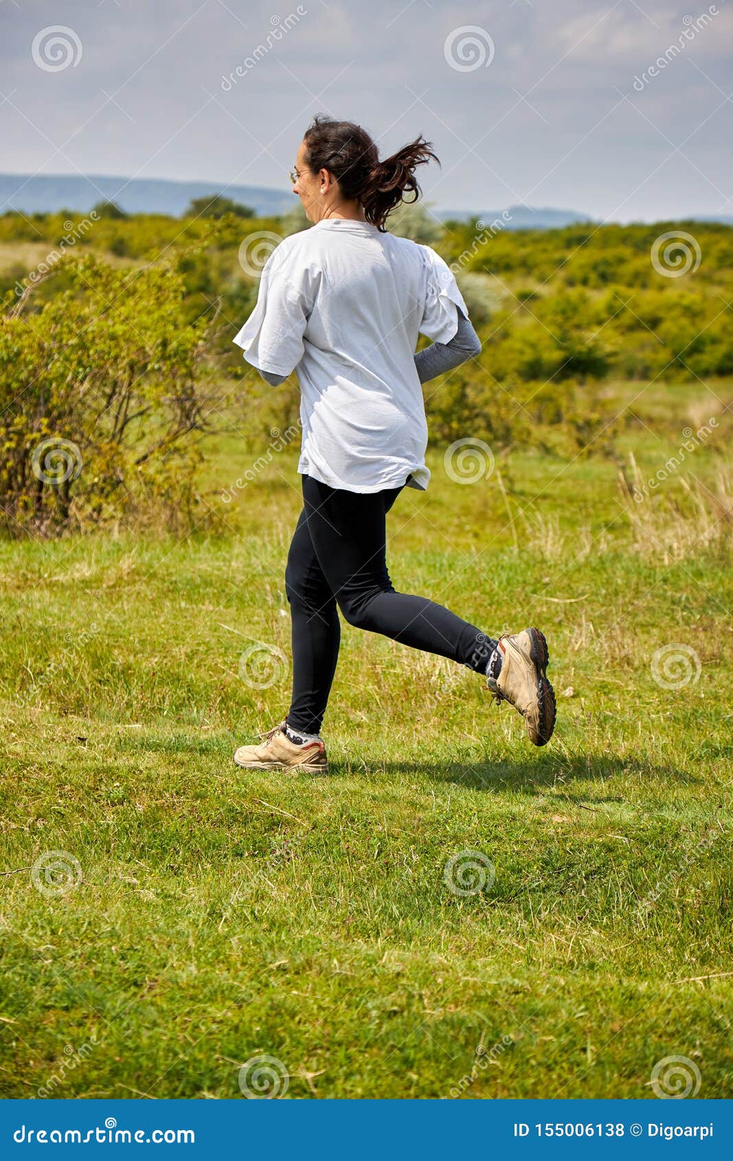 Spanish Woman Running on Meadow Stock Photo Image of marathon, runner