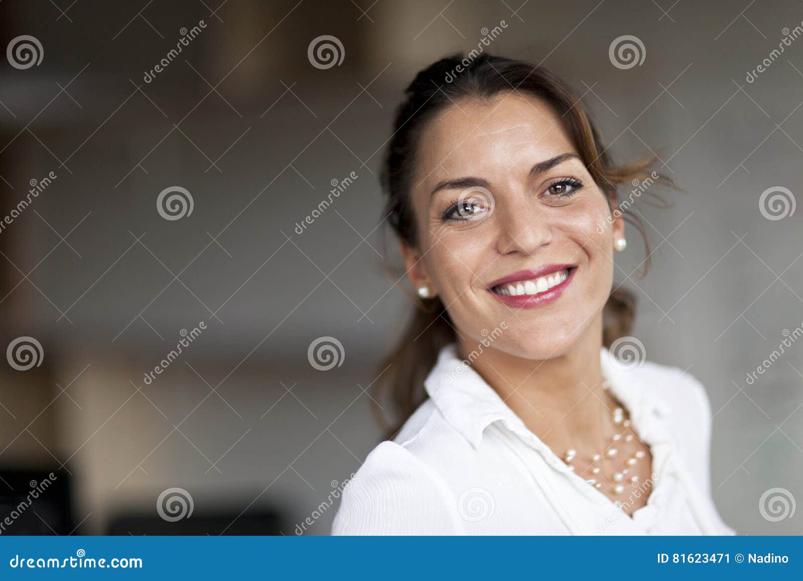 spanish woman smiling at the camera