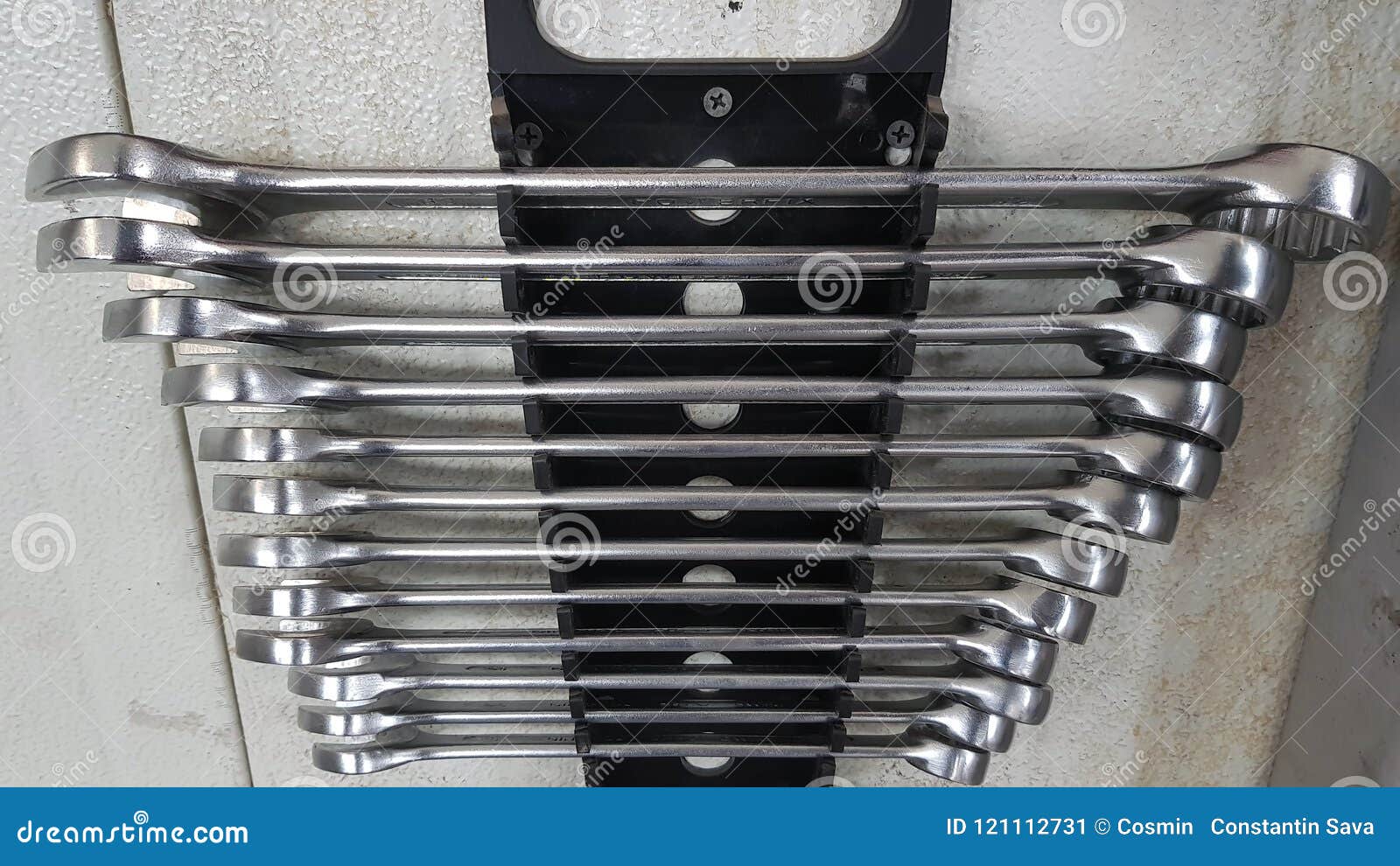 Spanner set on wall mount stock image. Image of manual 121112731