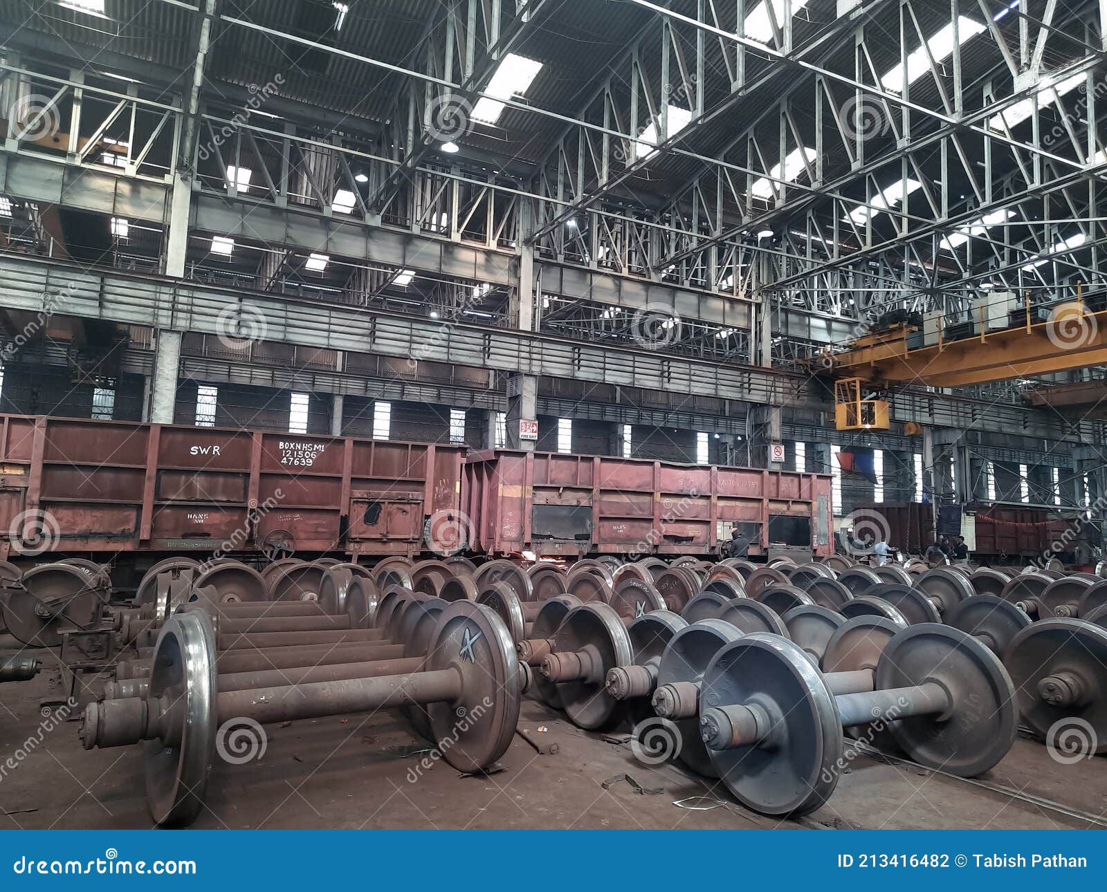 Spare Railway Wheels on the Axle in a Repair Editorial