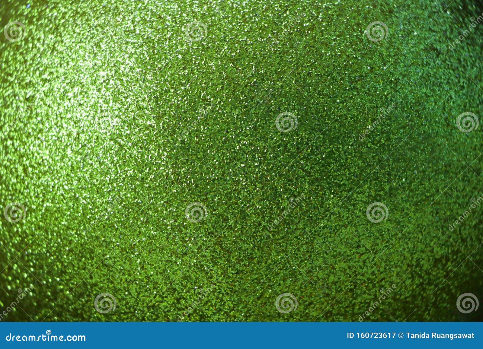 sparkle glowing dark green glitter of carborundum abstract textured background, can use for celebrate christmas day, new year day