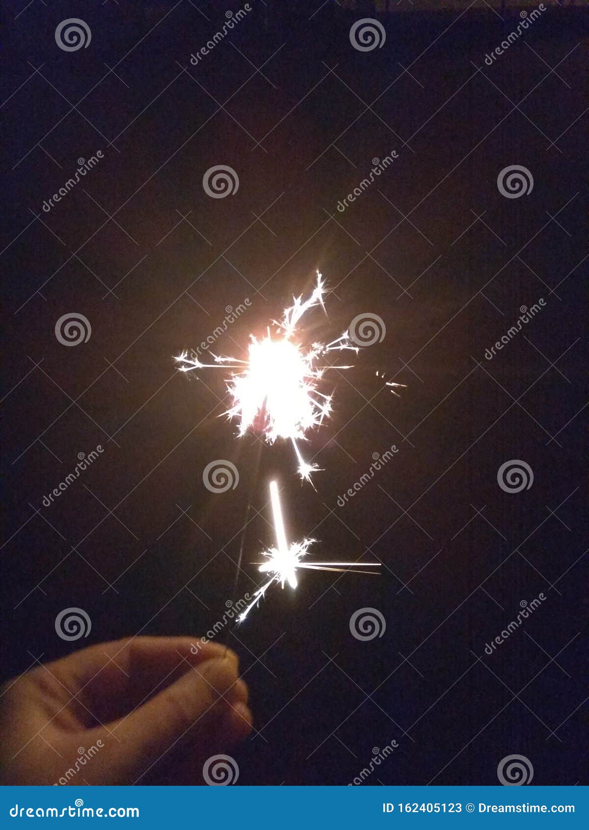 Sparkler in New Year`s Eve stock image. Image of christmas - 162405123