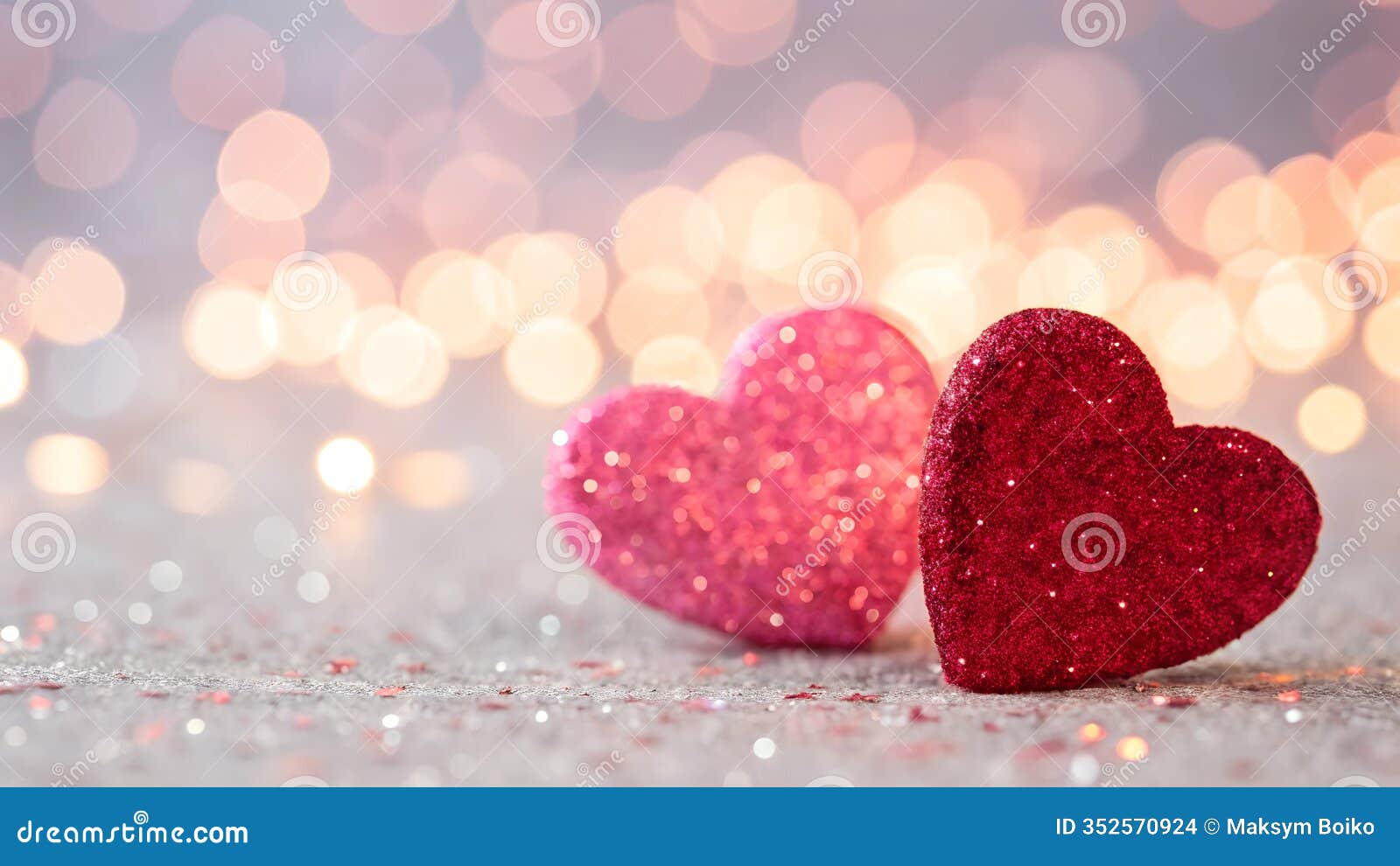 sparkling pink and red hearts on luminous bokeh for valentine's day.