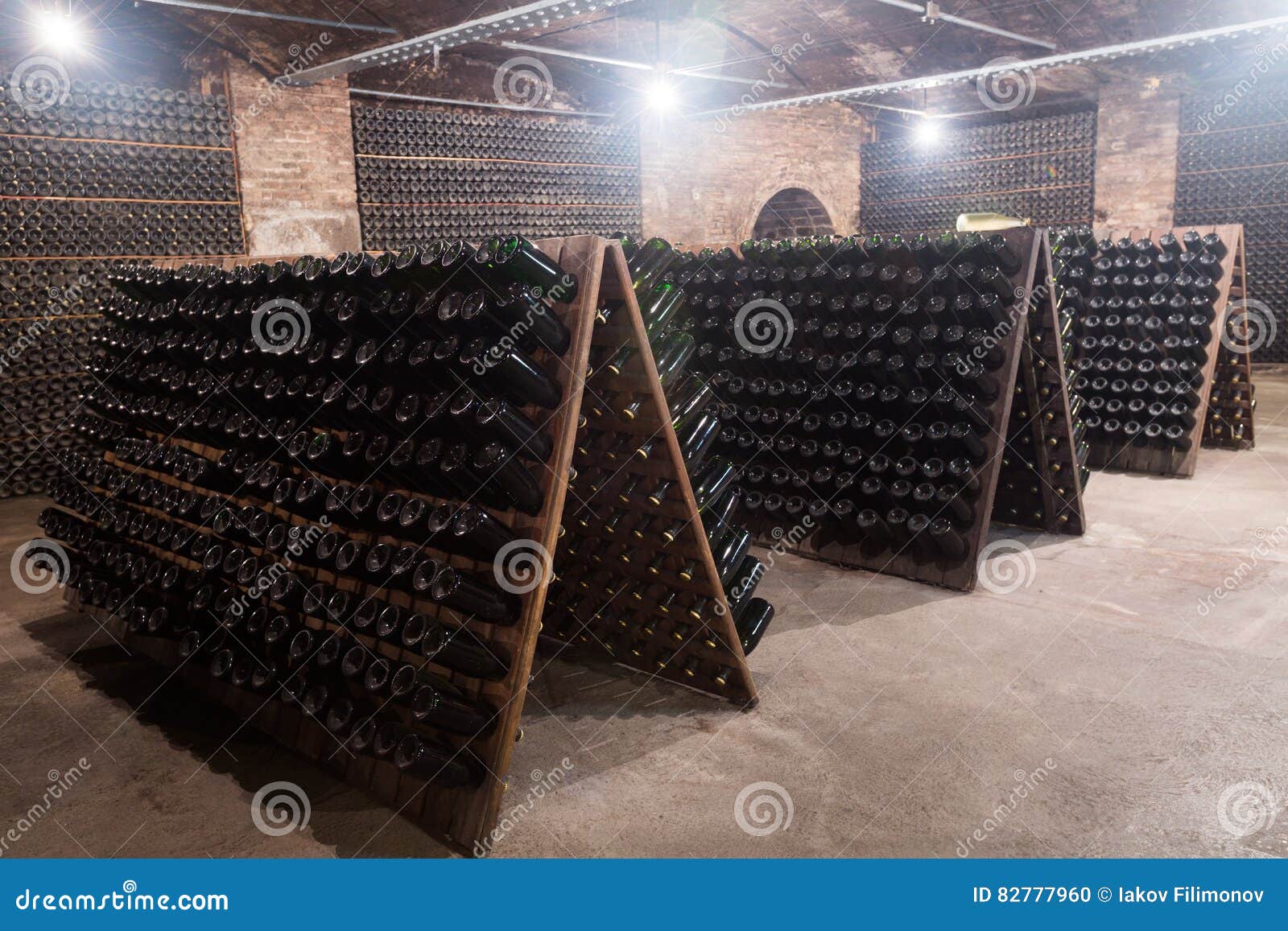 Sparkling Wine Bottles Fermenting in Winery Cellar Stock Photo Image