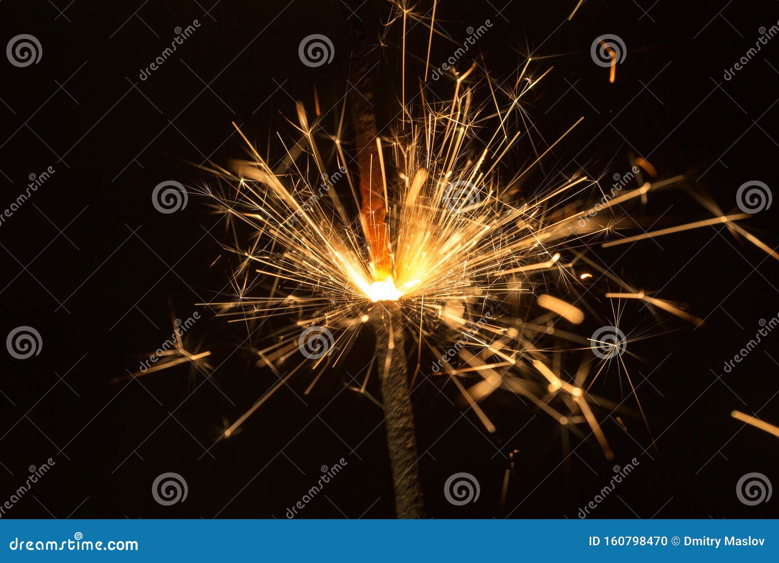 Sparks on black background stock photo. Image of shiny - 160798470