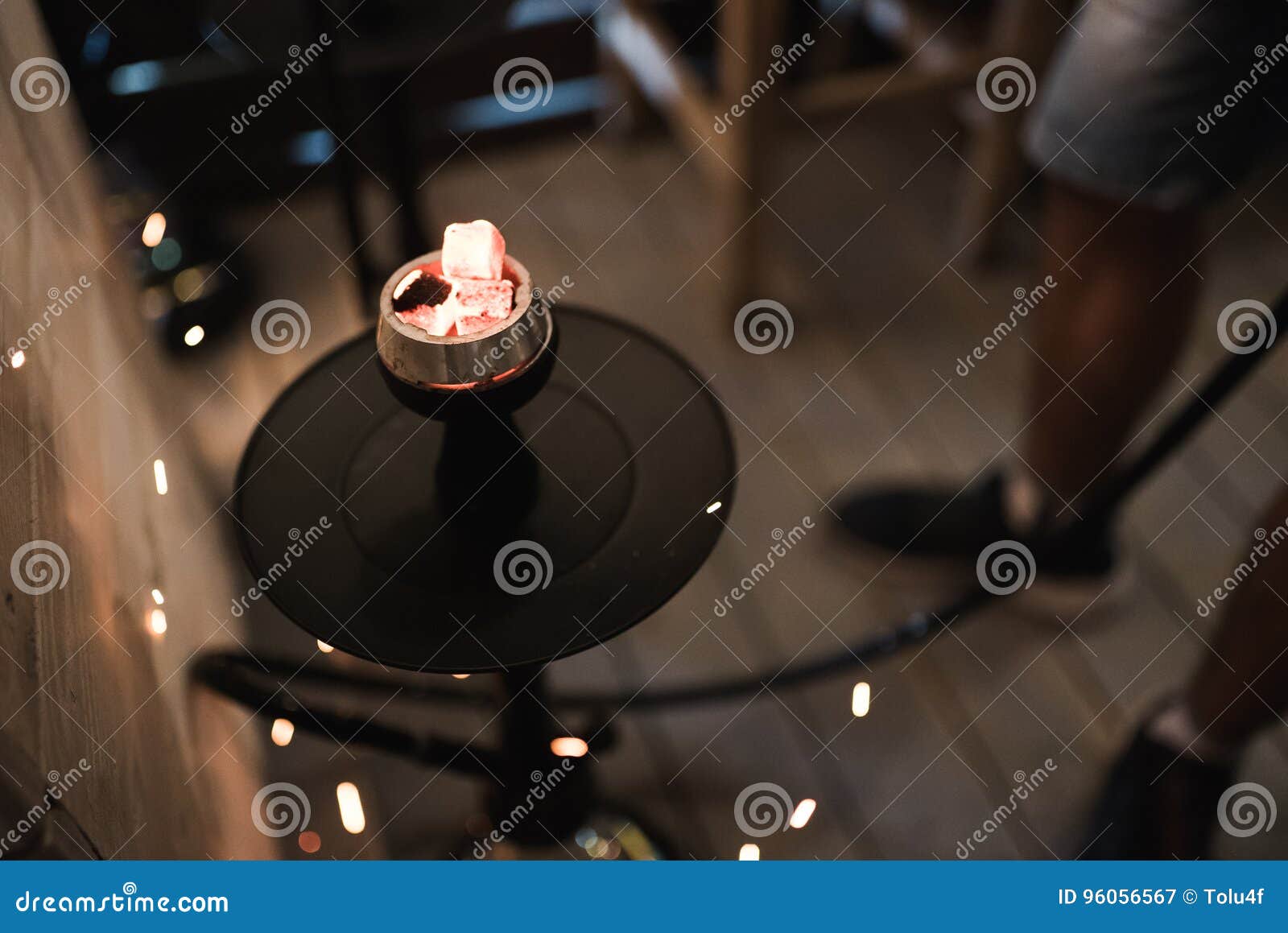 Sparks from the Burning Coals Hookah. Hookah Tobacco in Bowl Stock