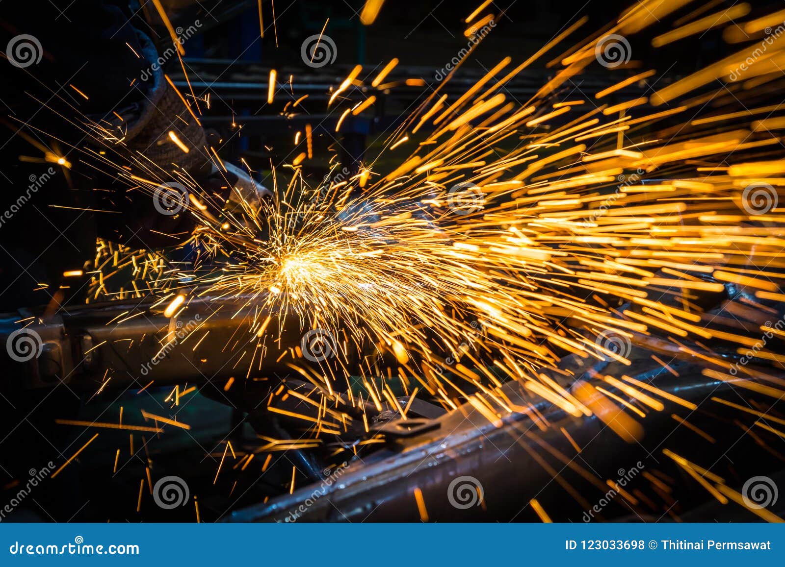 Sparks while grinding iron stock photo. Image of iron 123033698
