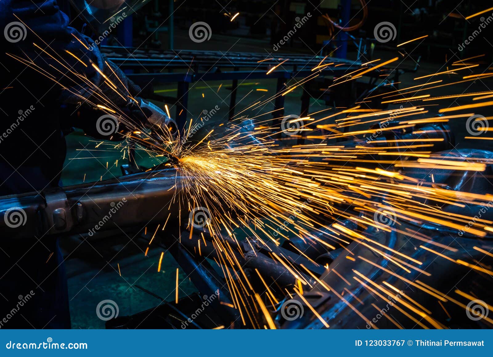 Sparks while grinding iron stock image. Image of cutting 123033767
