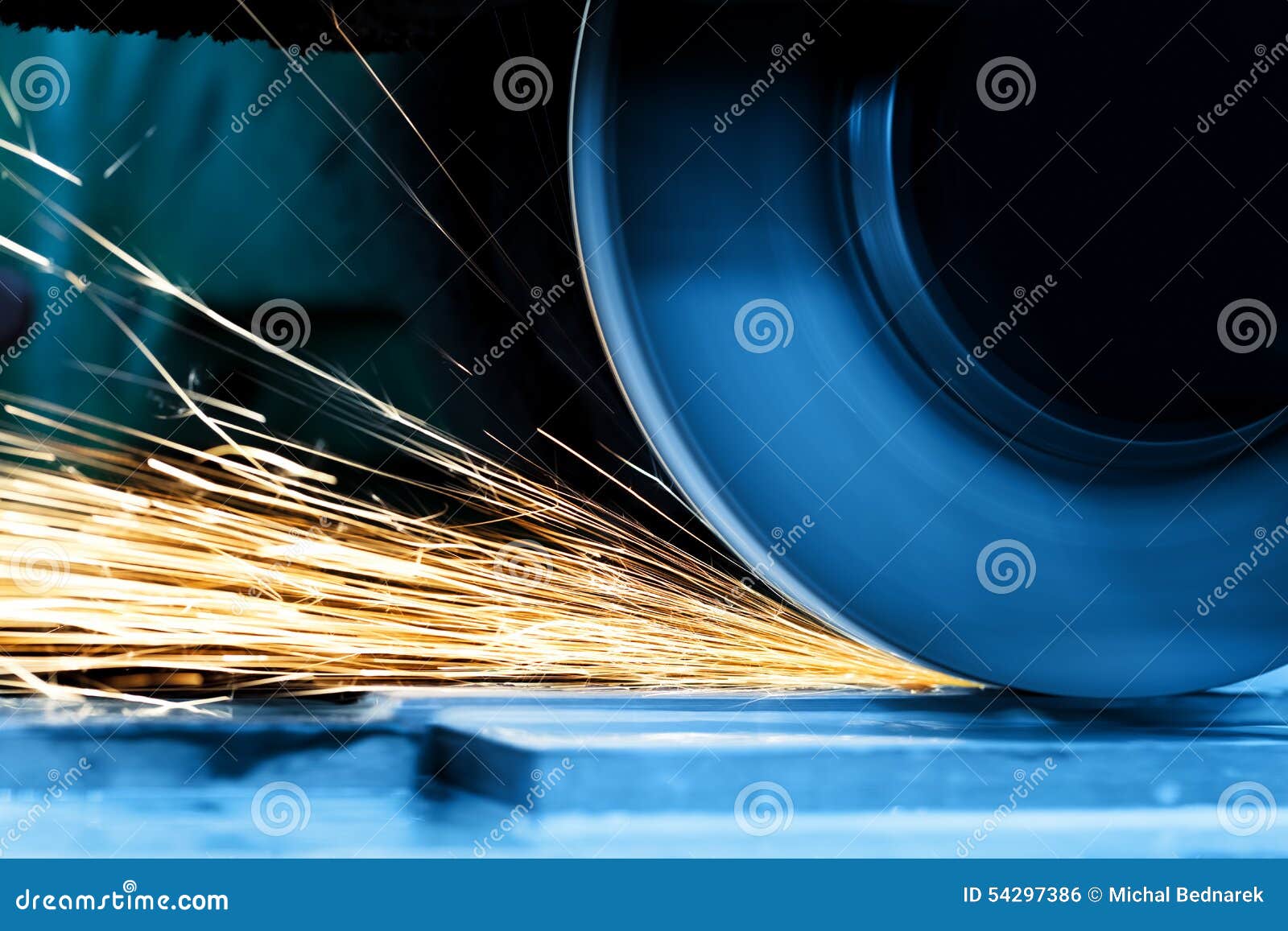 sparks from grinding machine. industrial, industry