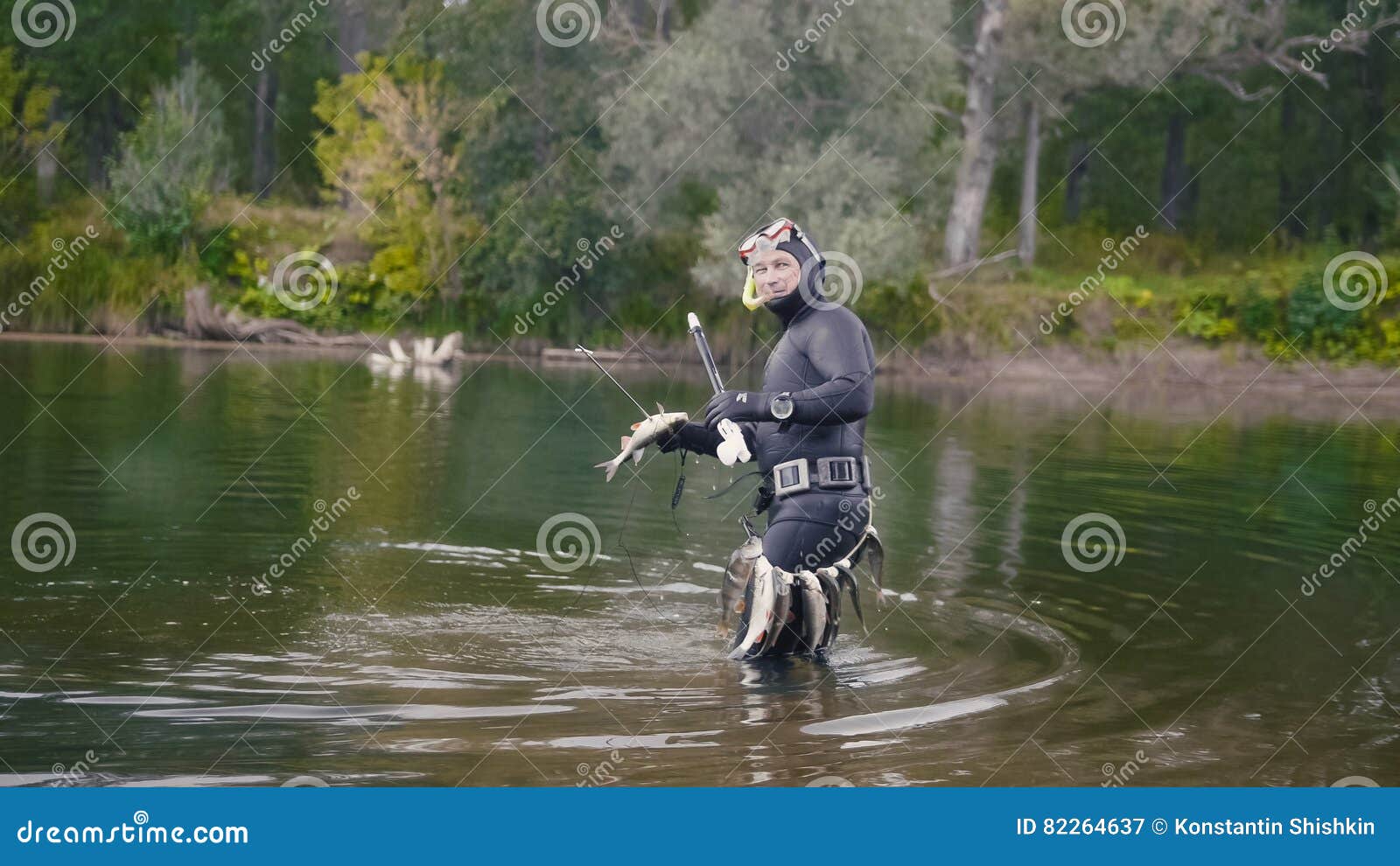 Spear Fisherman Shows Freshwater Fish at after Hunting in Forest River  Stock Image - Image of food, mouth: 82264637