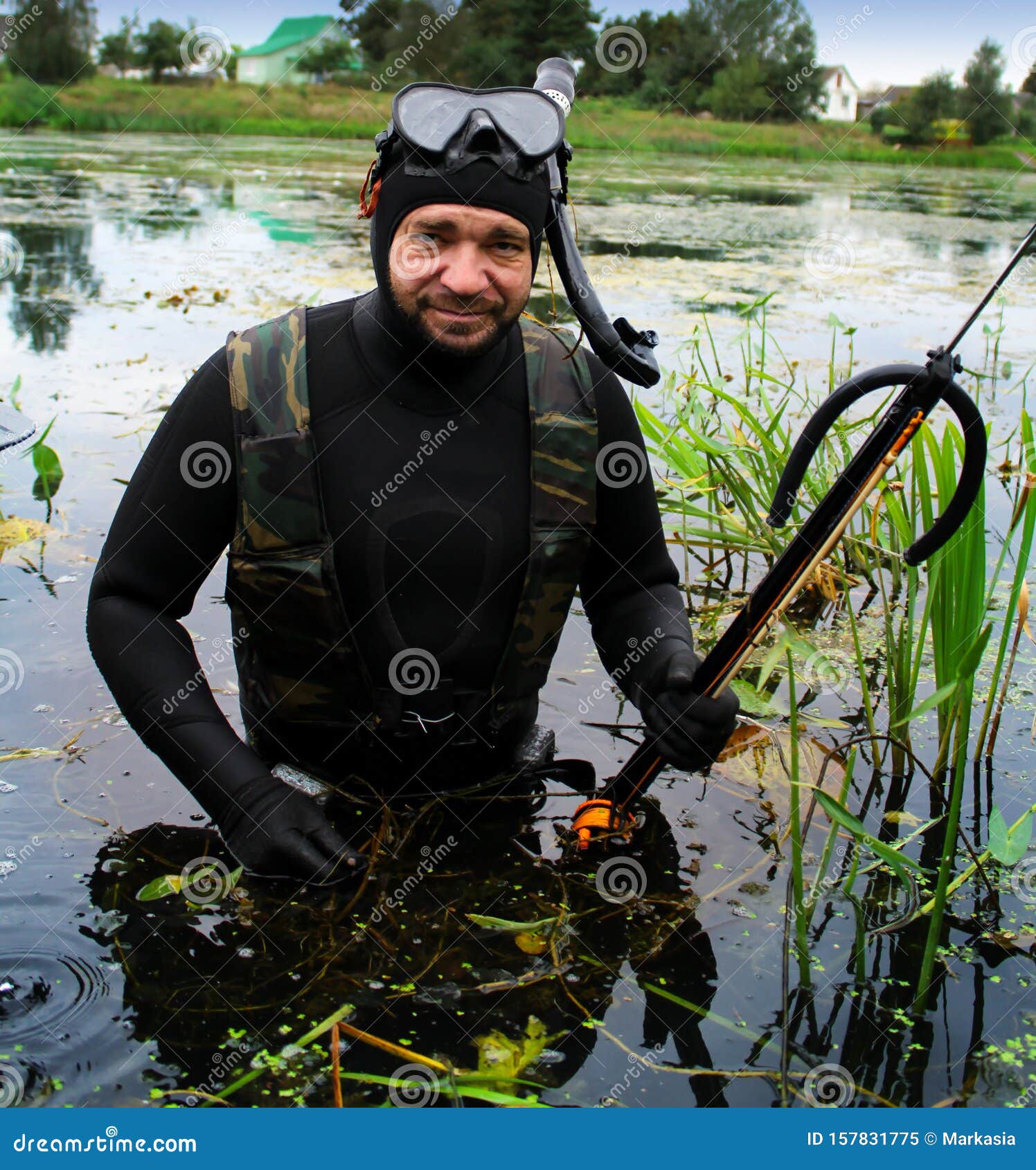 Spearfishing. a Man in a Wetsuit with a Fish Caught Stock Image Image
