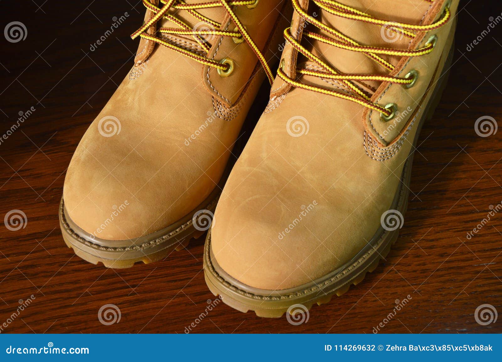 Sturdy hiking yellow boots stock photo. Image of dirty - 114269632