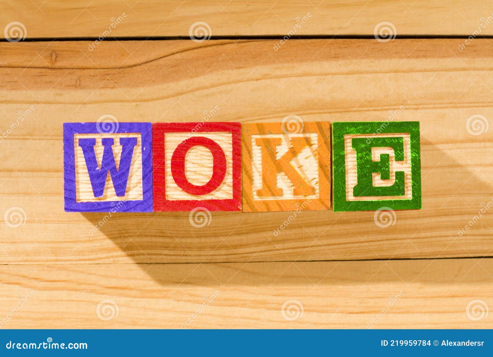 spectacular wooden cubes with the word woke on a wooden surface