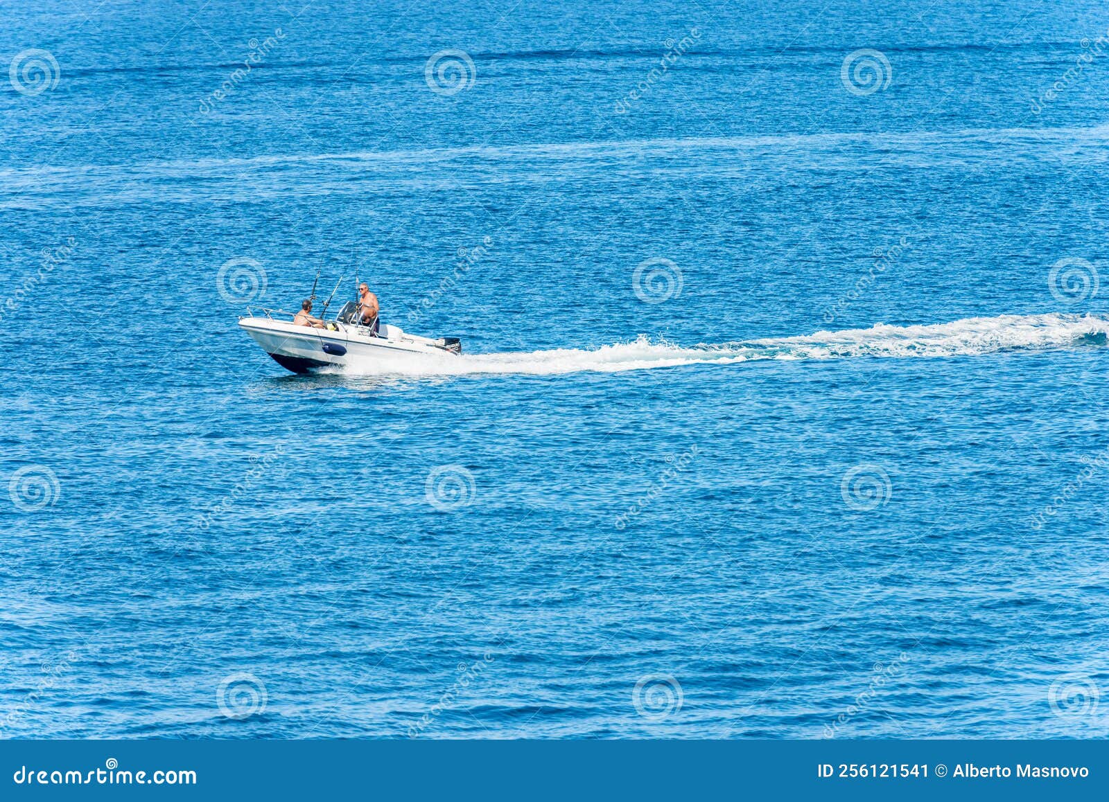 Speedboat with Adults Fishermen on Board with Fishing Rods