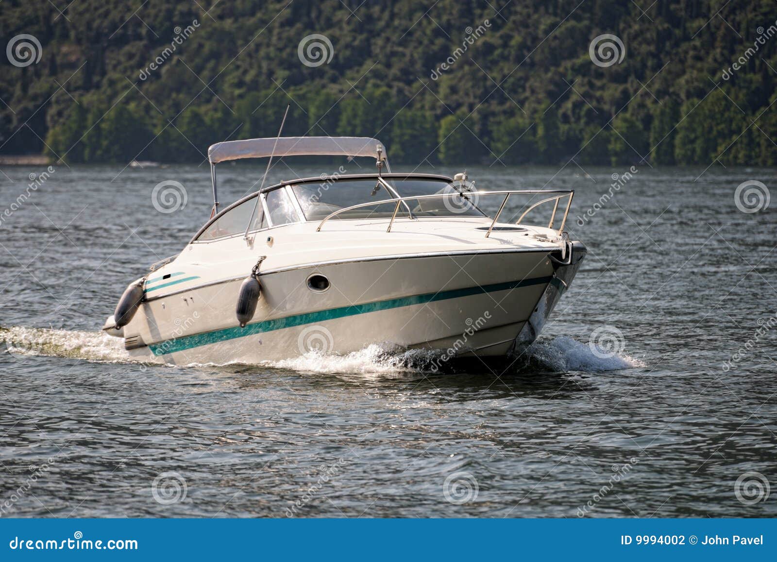 speedboat cruising on lake iseo, lombardy, italy