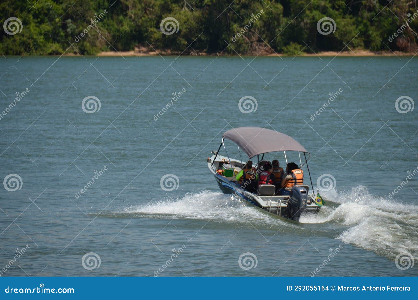 speedboat on the paranÃ¡ river, in porto camargo, brazil.