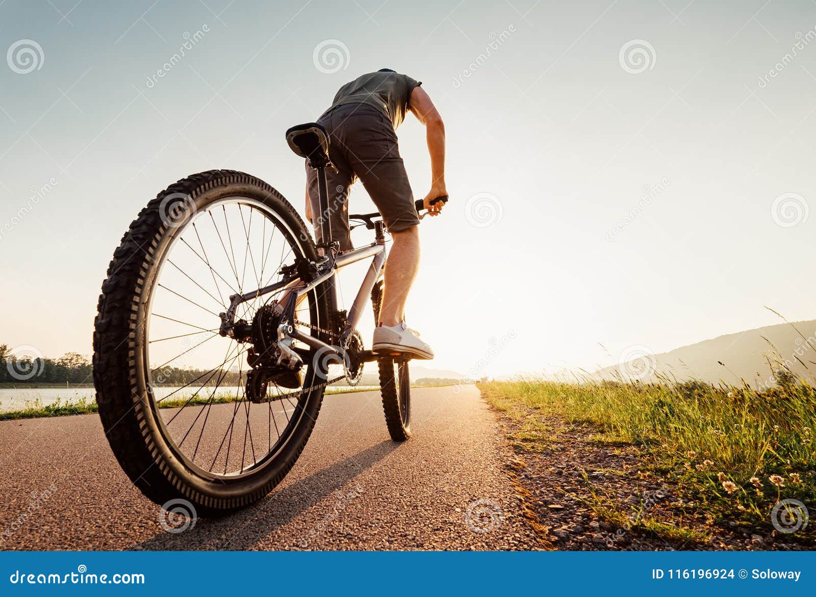 speedy bicyclist wide angle shoot