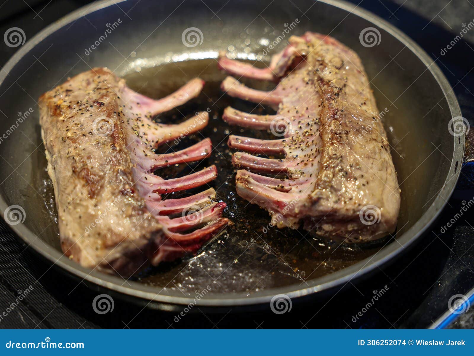 Spiced Saddle of Lamb Grilled in a Pan. Stock Photo - Image of chops ...