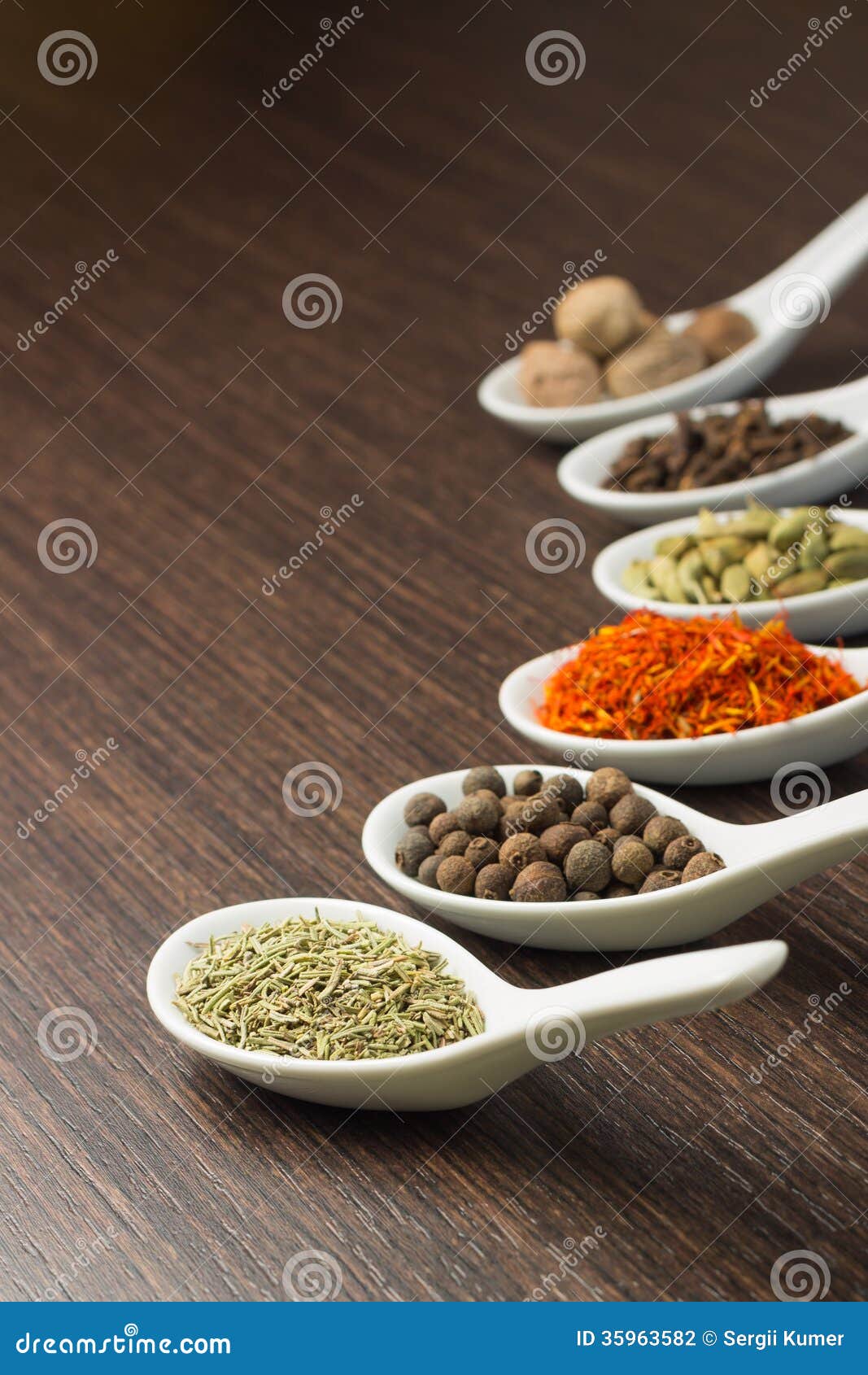 Spices in Ceramic Spoon stock photo. Image of paprika 35963582