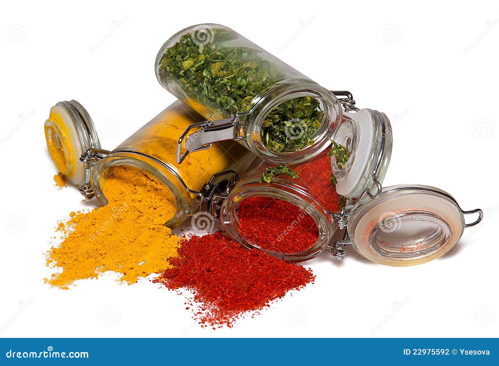 Spices in glass containers stock photo. Image of condiments 22975592