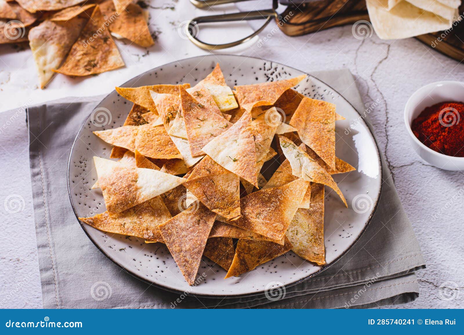 Spicy Chips with Paprika and Dill from Tortilla on a Plate Stock Image