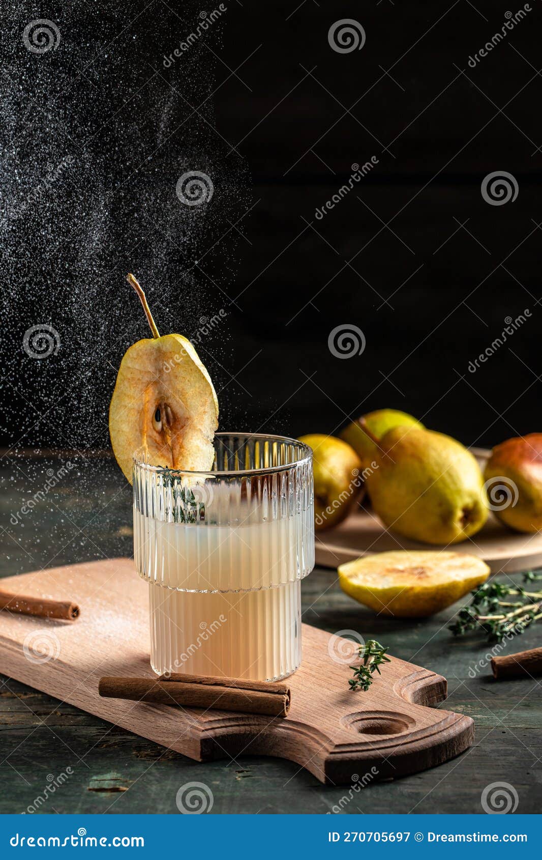 Spicy Cocktail with Pears and Thyme. Mulled Wine. Vertical Image. Top