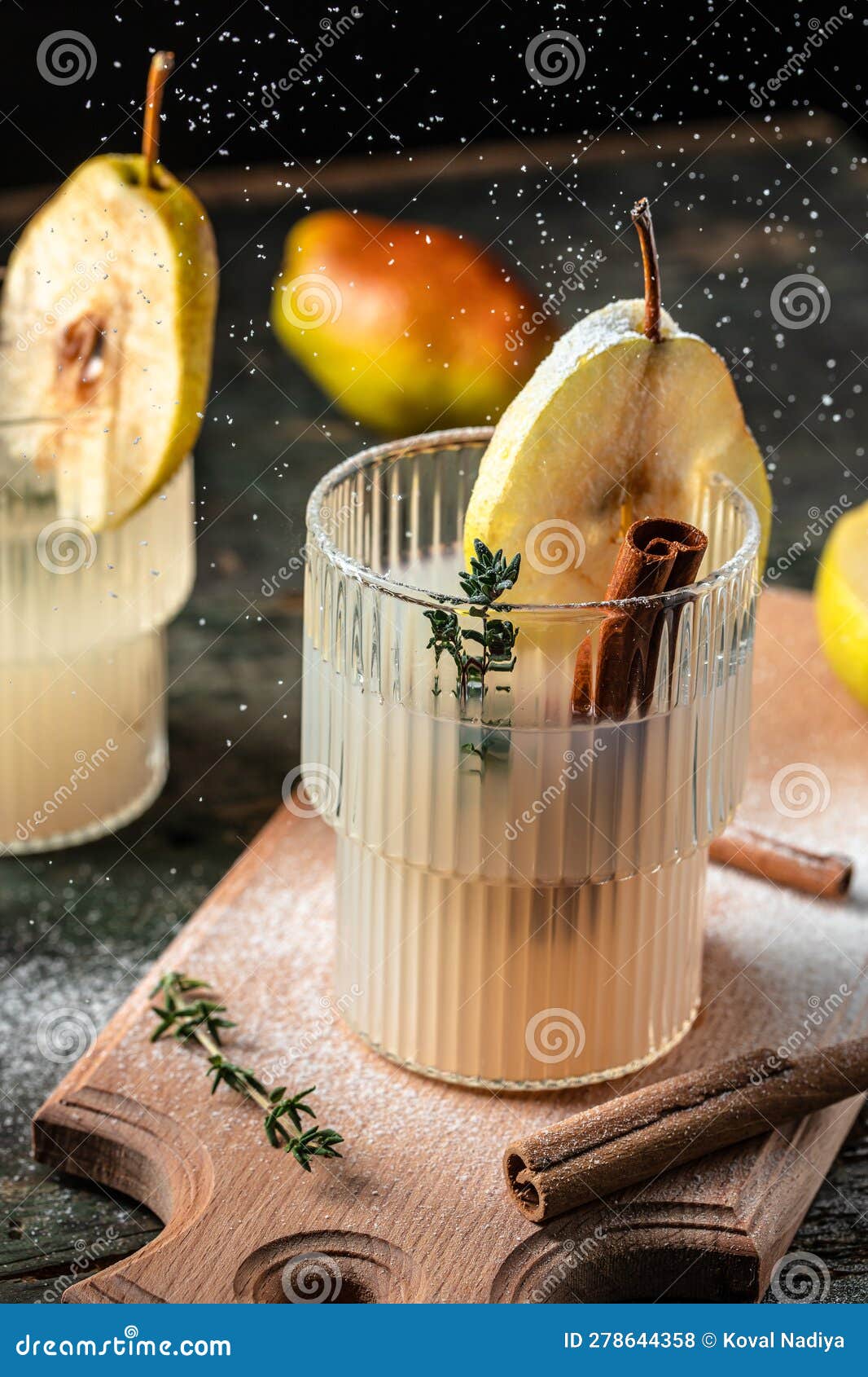 Spicy Cocktail with Pears and Thyme. Mulled Wine. Vertical Image. Top