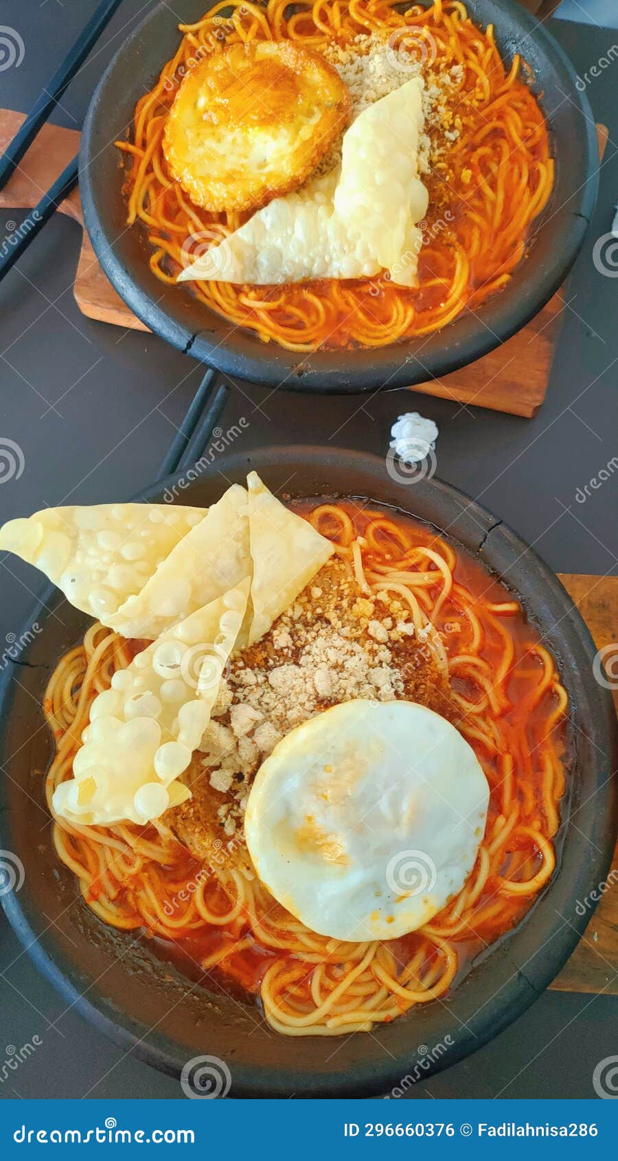 Spicy Noodles with Half Boiled Egg and Dumplings Stock Photo Image of