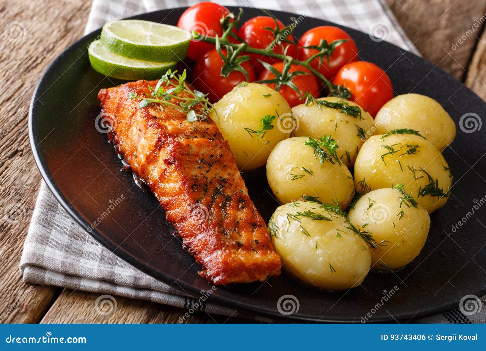 Spicy Roasted Salmon and Boiled Potatoes, Fresh Tomatoes Close-up ...